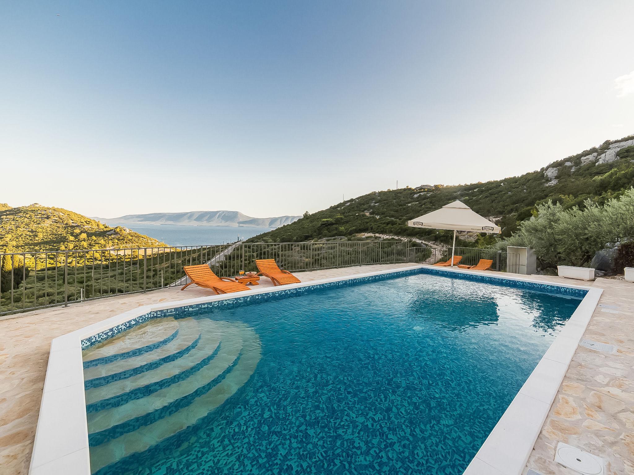 Foto 5 - Haus mit 1 Schlafzimmer in Ploče mit schwimmbad und blick aufs meer