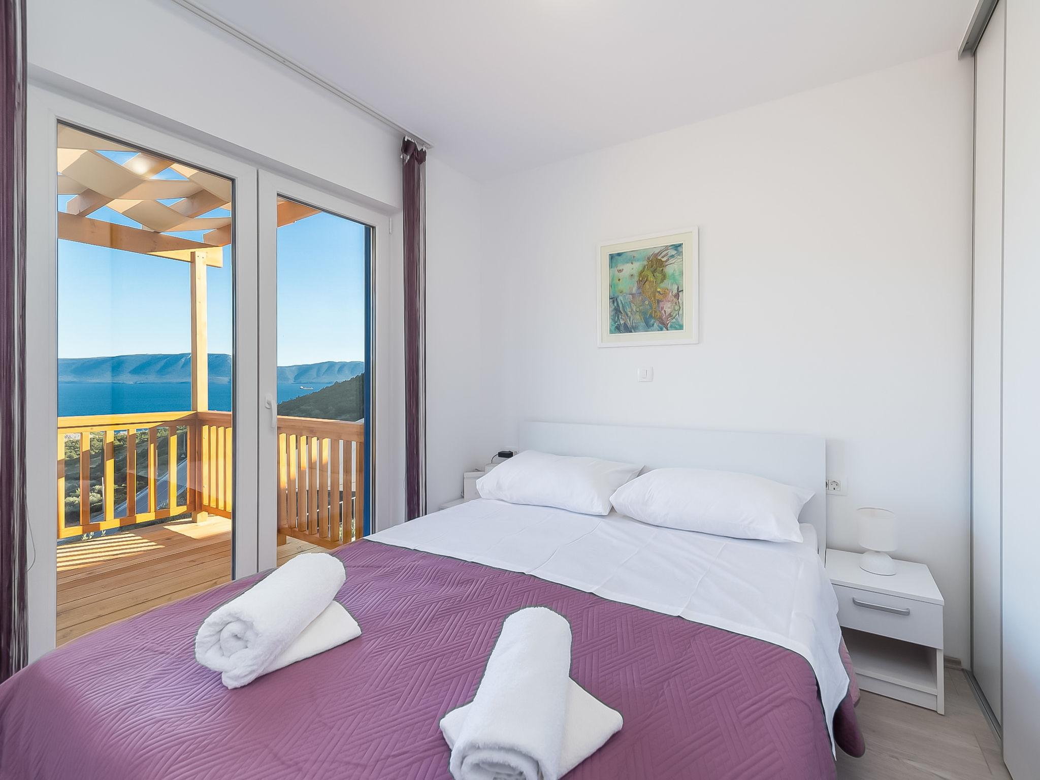 Photo 2 - Maison de 1 chambre à Ploče avec piscine et vues à la mer