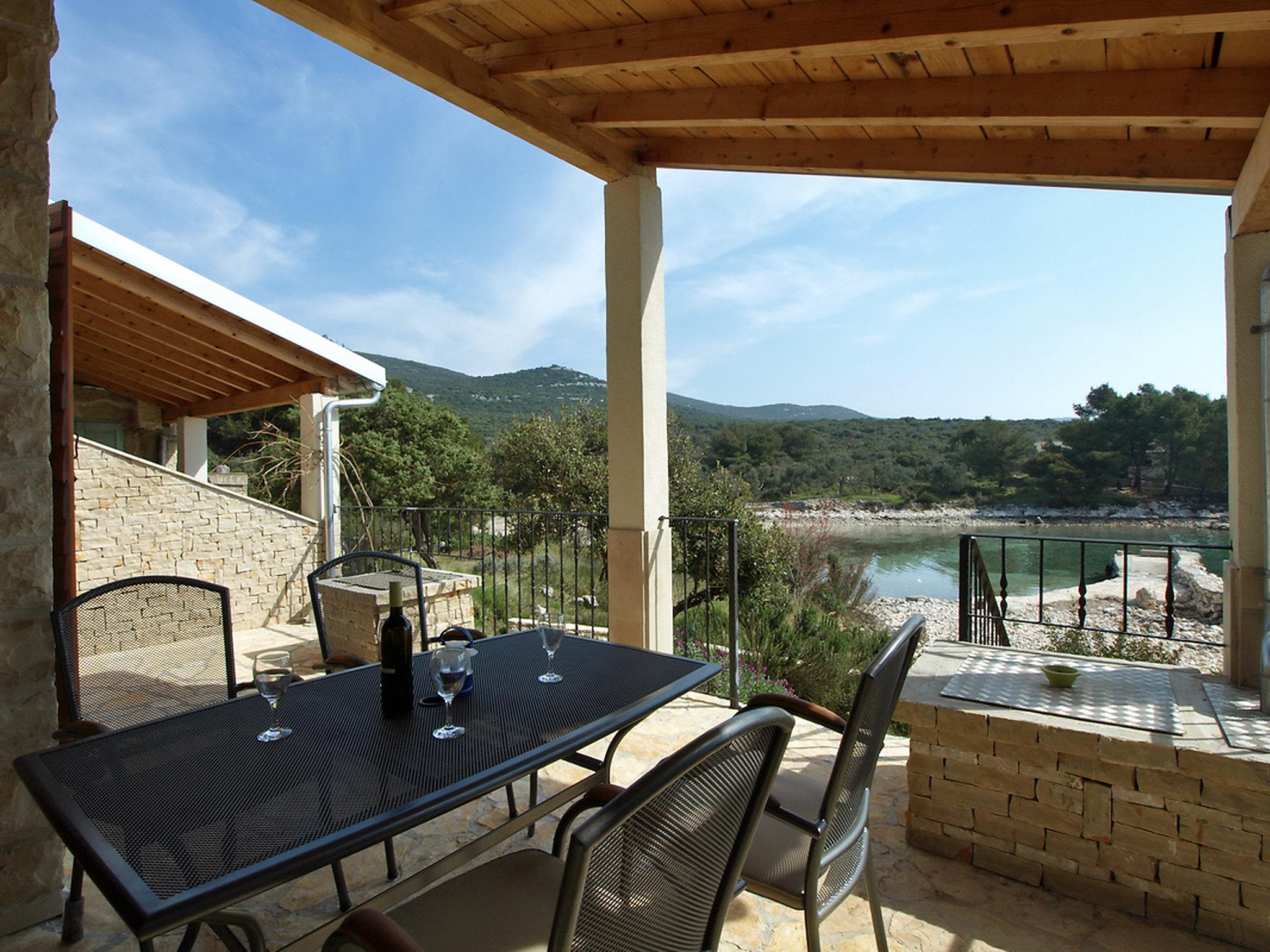 Photo 13 - Maison de 2 chambres à Pašman avec terrasse et vues à la mer