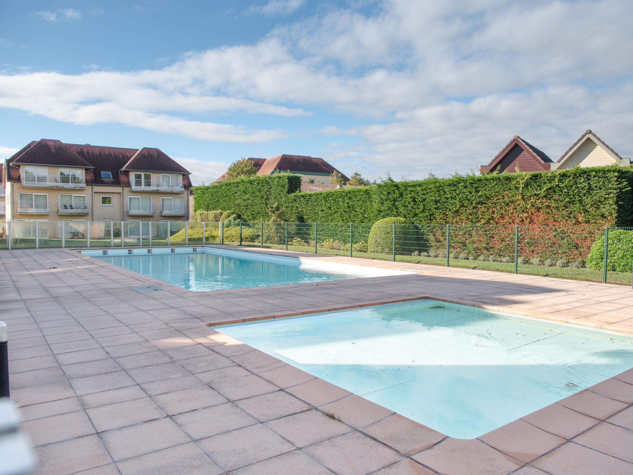 Photo 1 - Appartement en De Haan avec piscine et vues à la mer