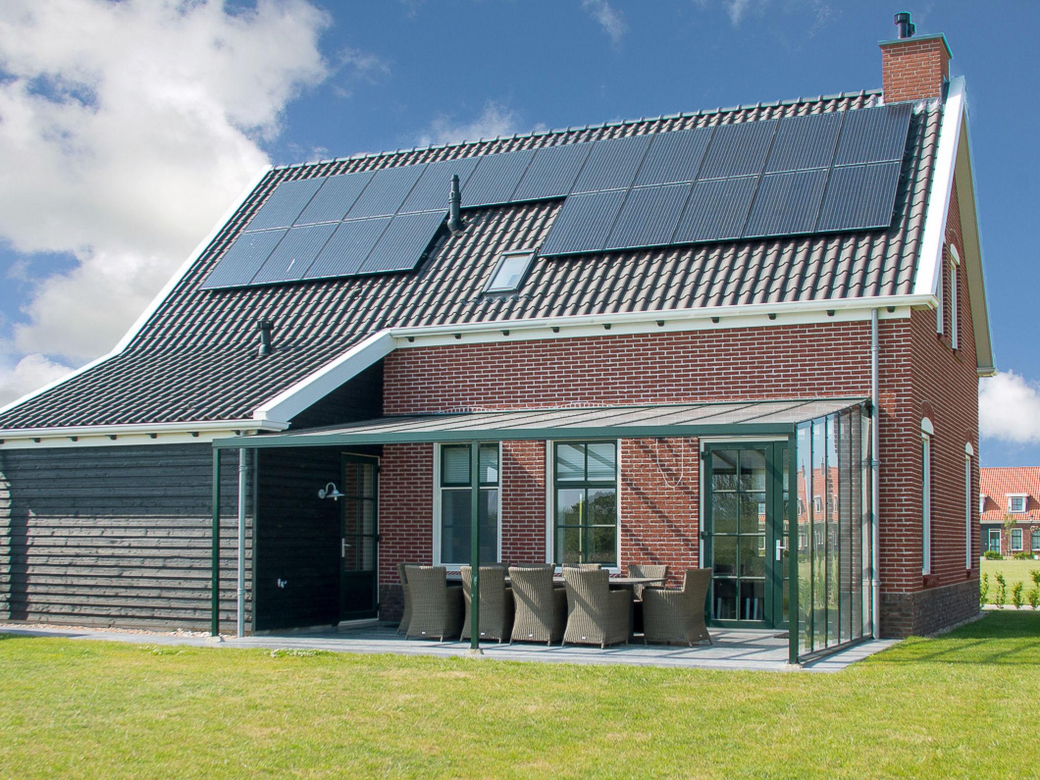 Foto 1 - Casa con 5 camere da letto a Colijnsplaat con terrazza e vista mare