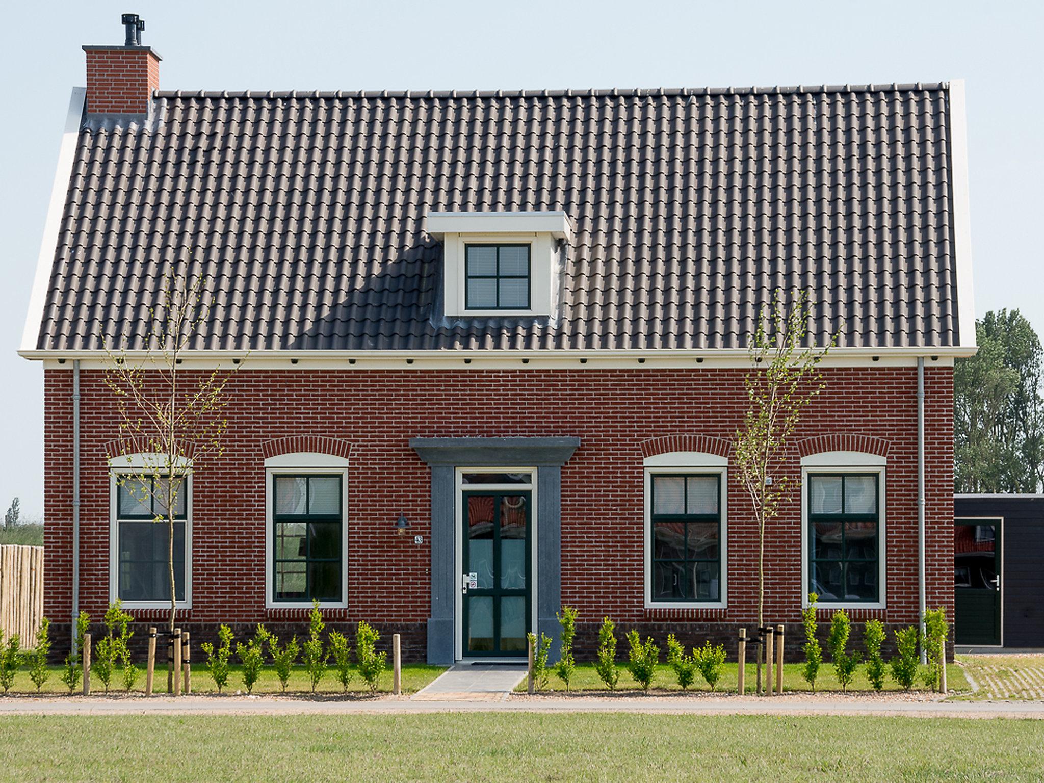 Photo 13 - Maison de 5 chambres à Colijnsplaat avec jardin et terrasse