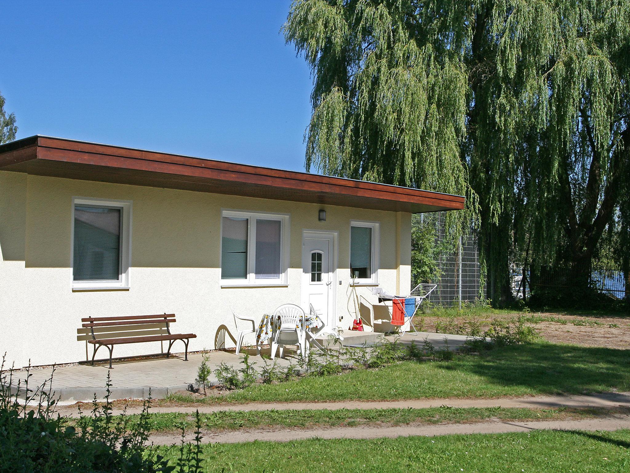 Foto 1 - Haus mit 1 Schlafzimmer in Krakow am See mit garten und blick auf die berge