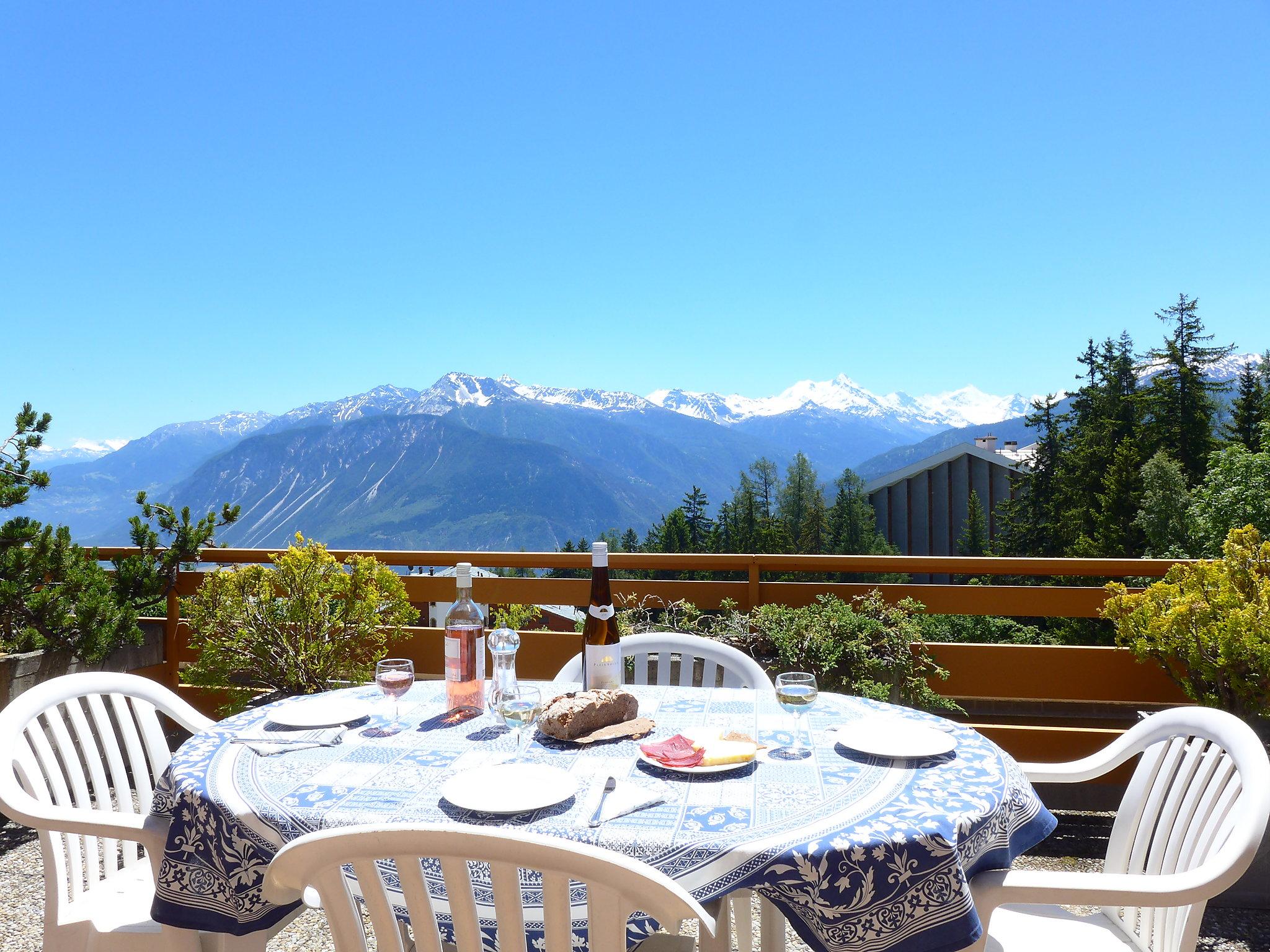 Foto 1 - Appartamento con 1 camera da letto a Crans-Montana con piscina e vista sulle montagne