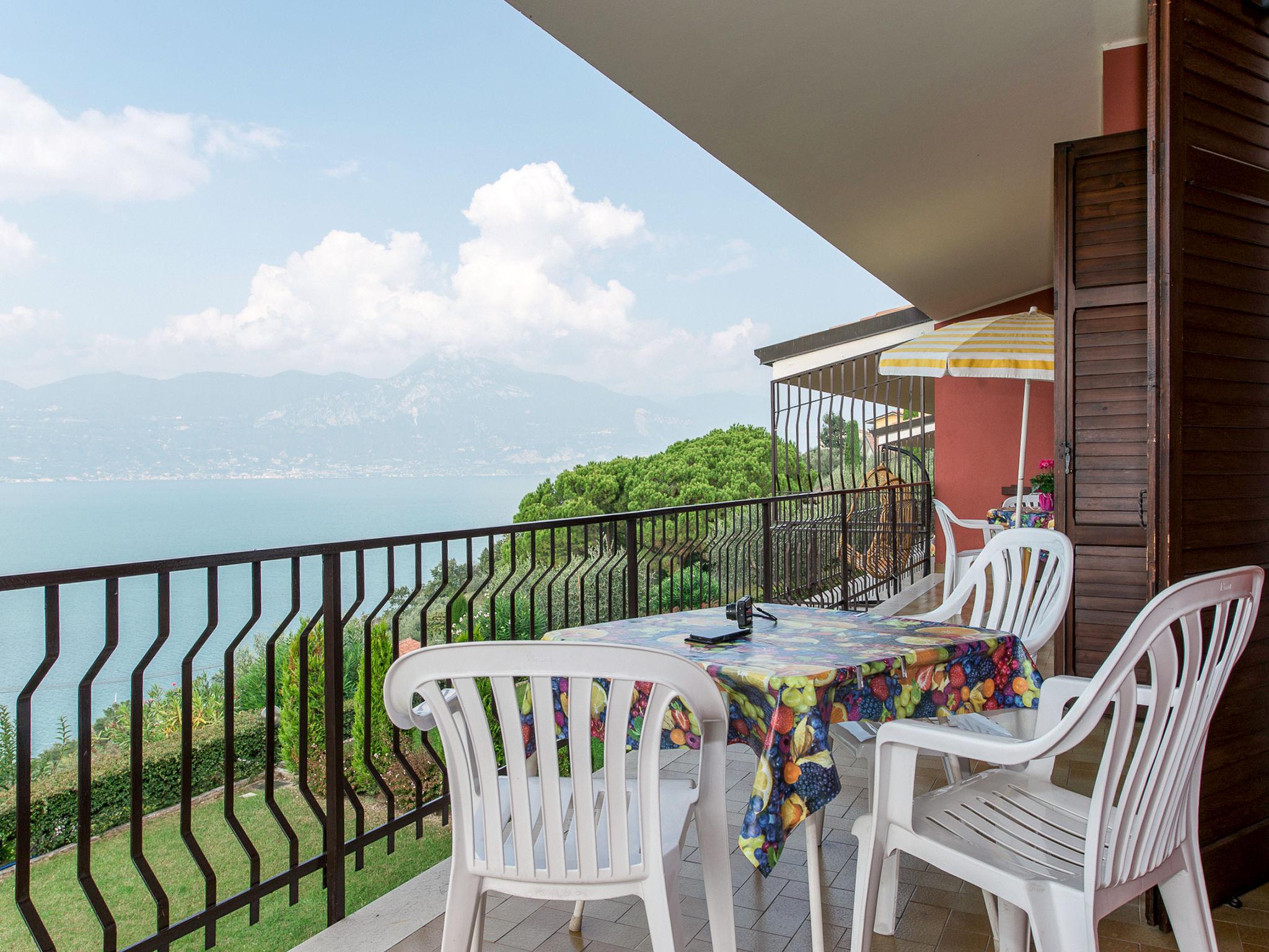 Foto 5 - Appartamento con 2 camere da letto a Torri del Benaco con piscina e vista sulle montagne