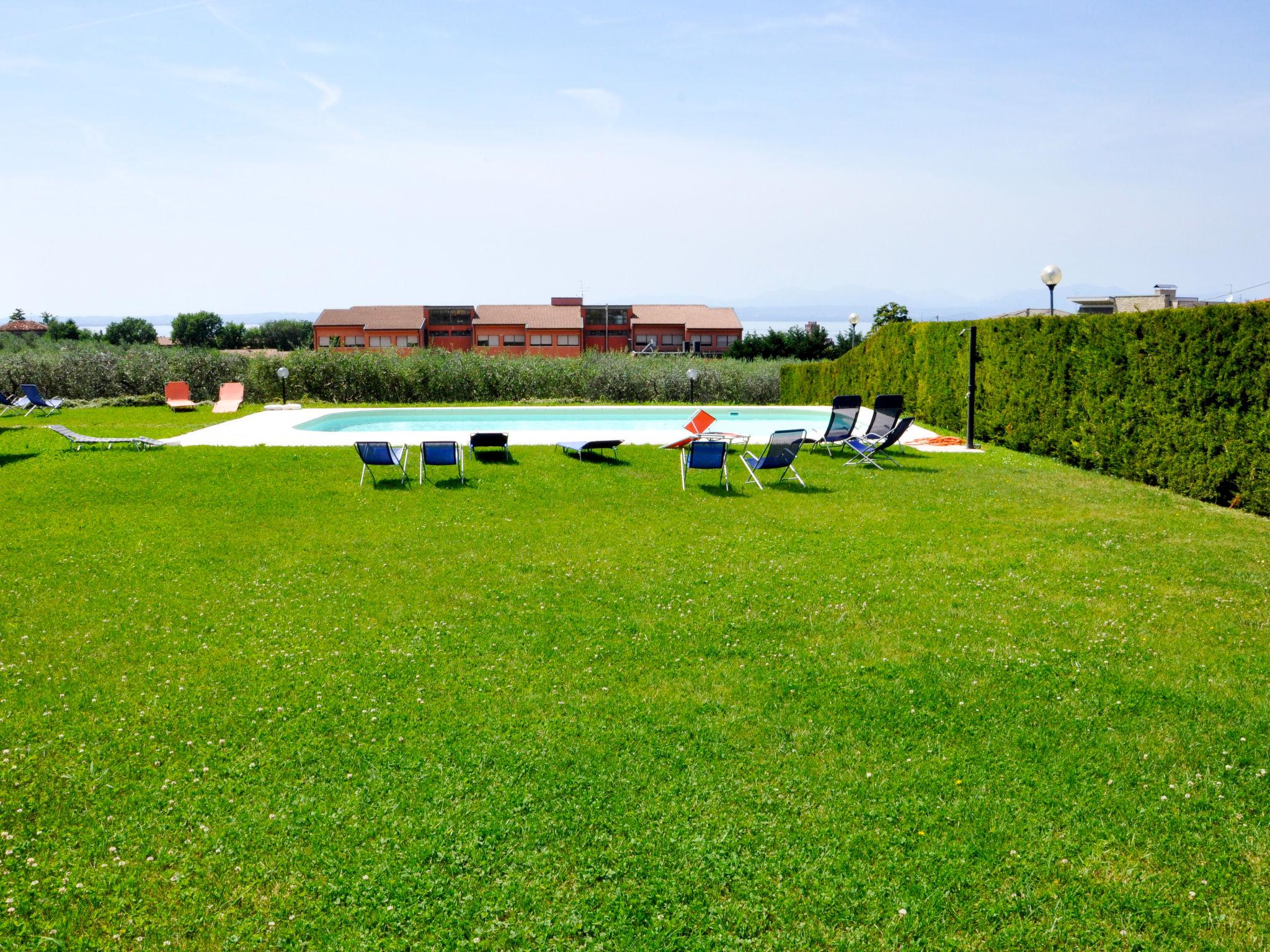 Foto 12 - Appartamento con 2 camere da letto a Lazise con piscina e vista sulle montagne