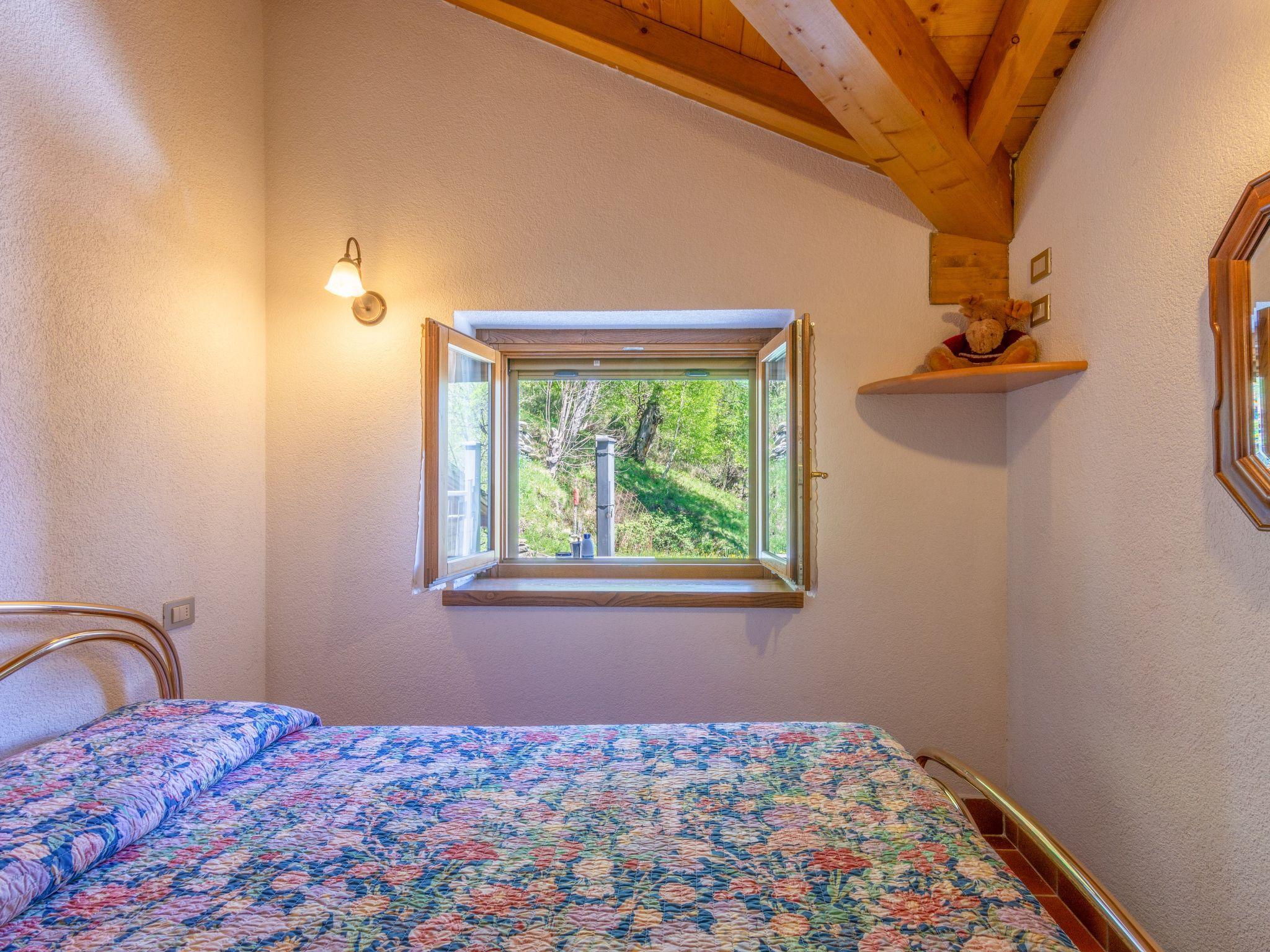 Photo 11 - Maison de 2 chambres à Peglio avec terrasse et vues sur la montagne