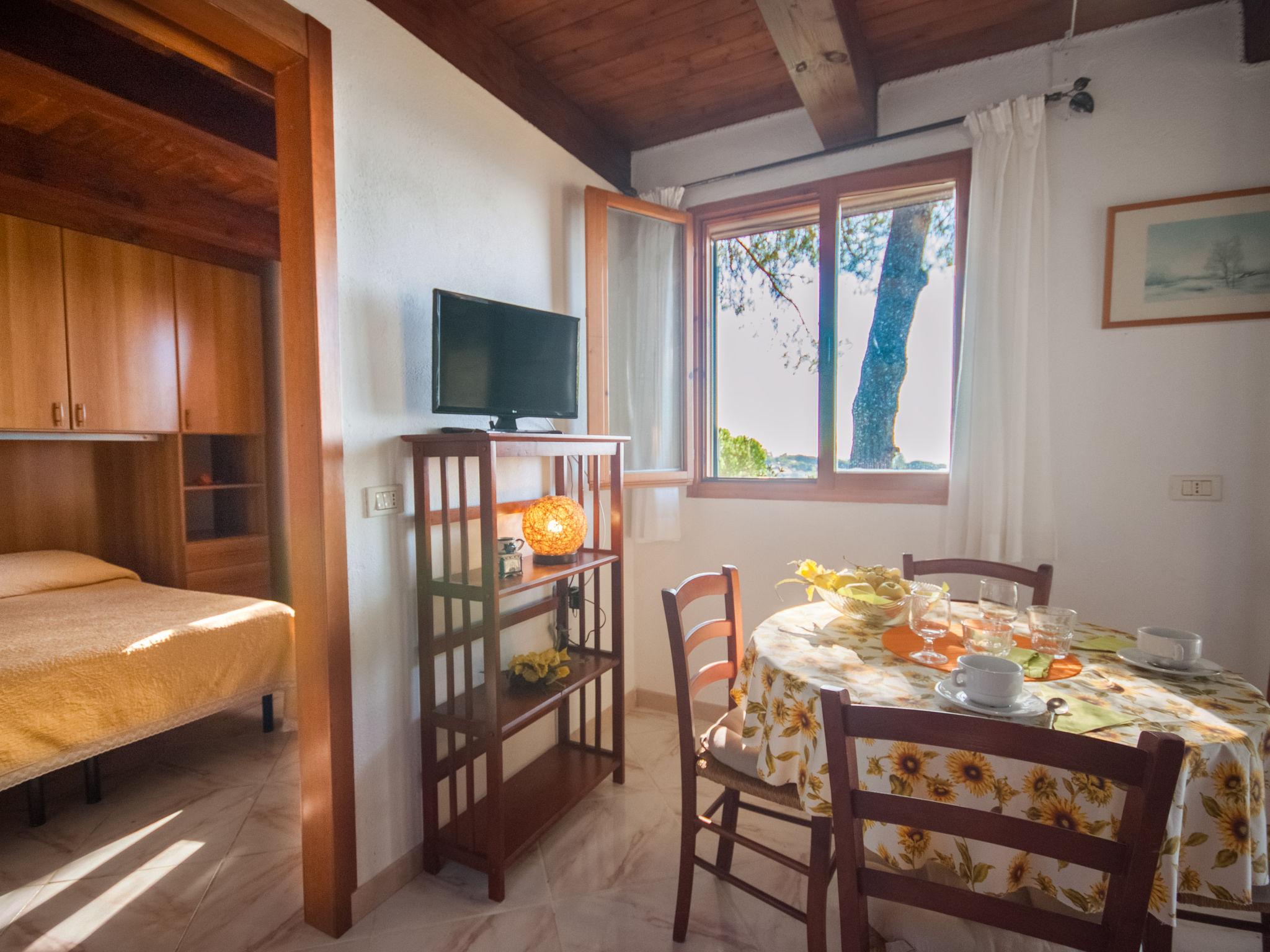 Photo 8 - Maison de 1 chambre à Capoliveri avec jardin et terrasse