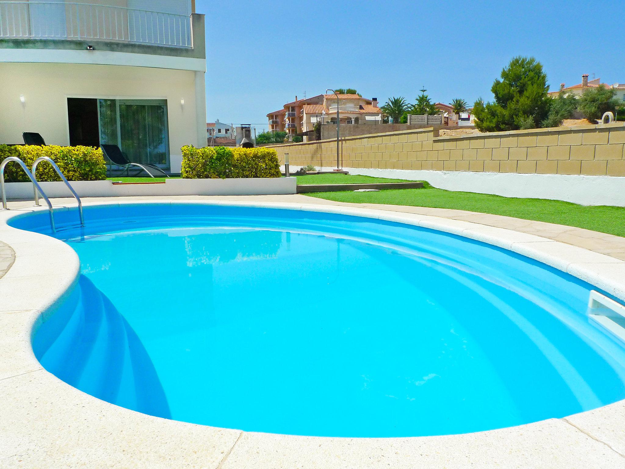 Foto 1 - Casa con 4 camere da letto a l'Ampolla con piscina privata e giardino