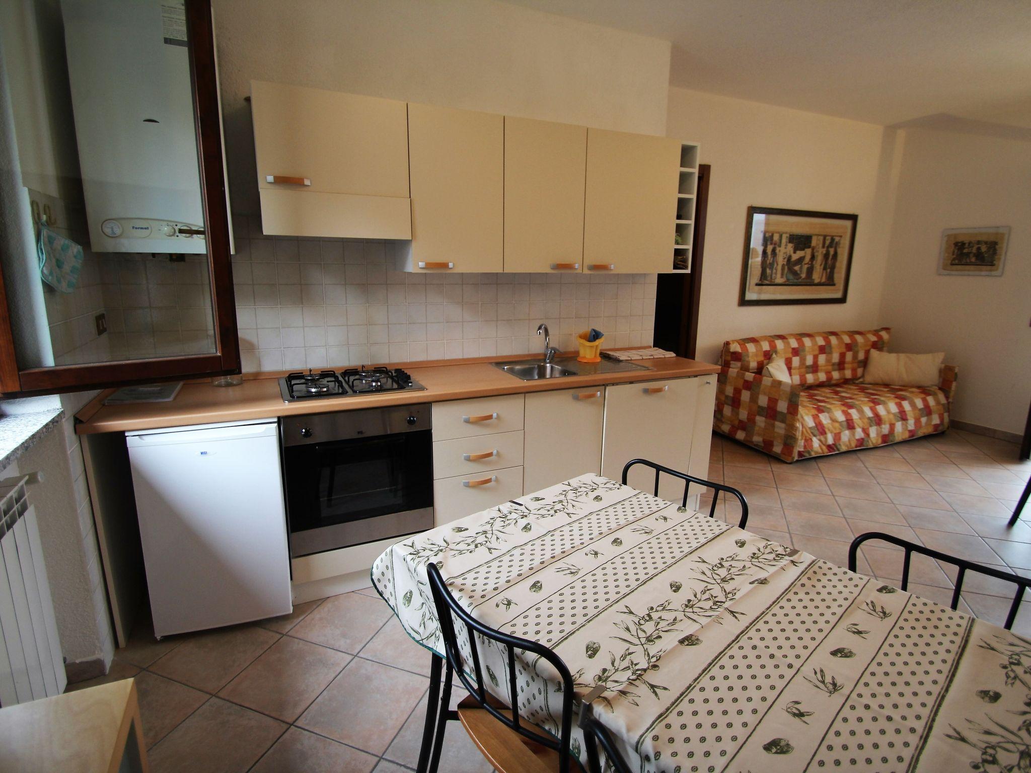 Photo 10 - 2 bedroom Apartment in Castelveccana with swimming pool and garden