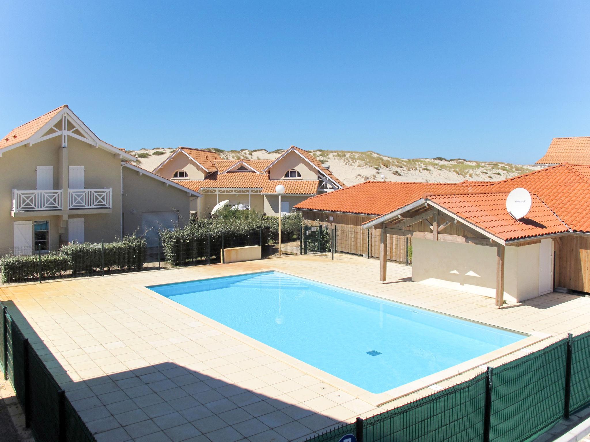 Foto 1 - Casa de 3 habitaciones en Biscarrosse con piscina y vistas al mar