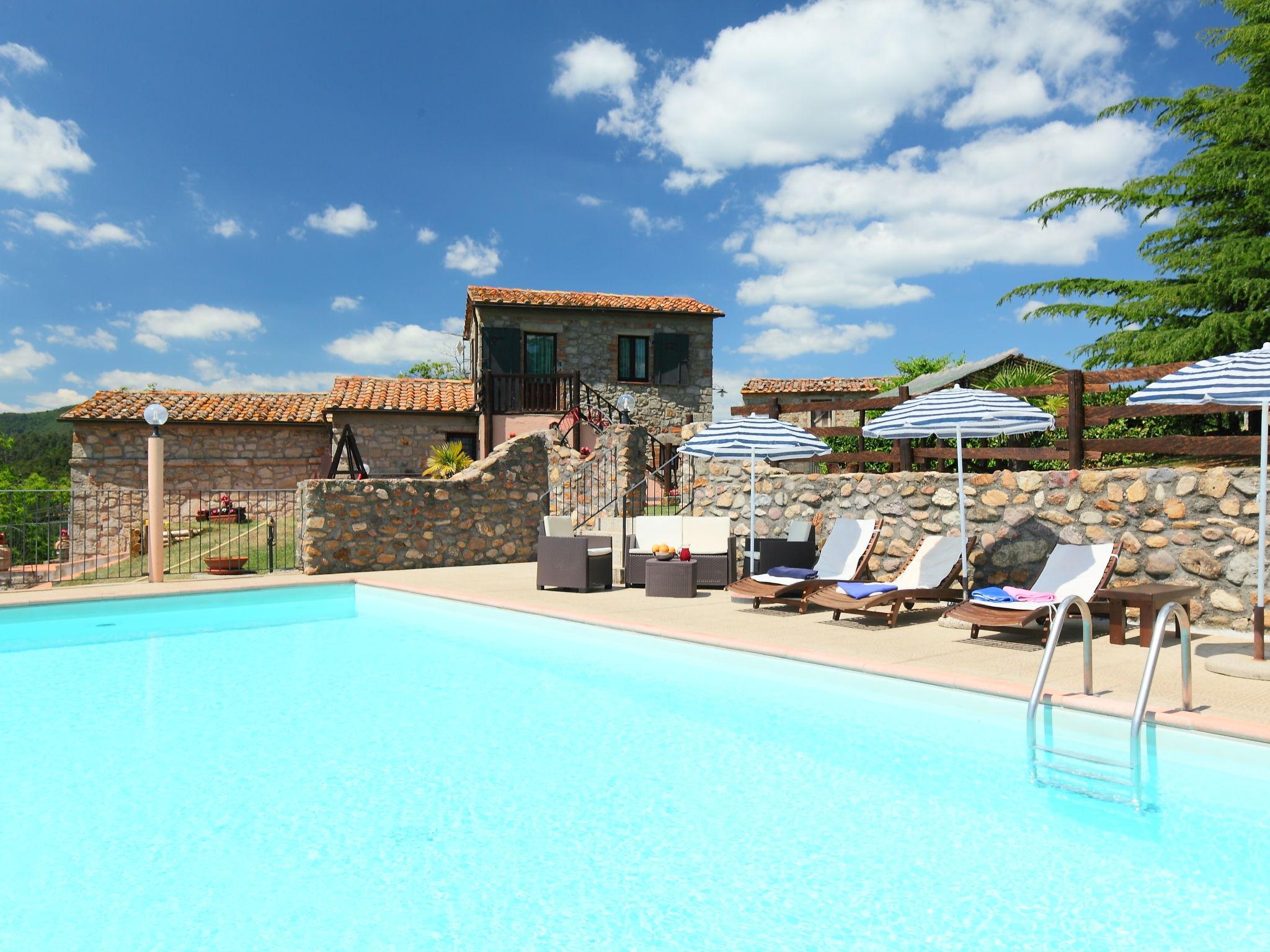 Foto 1 - Casa de 2 quartos em Roccastrada com piscina privada e jardim