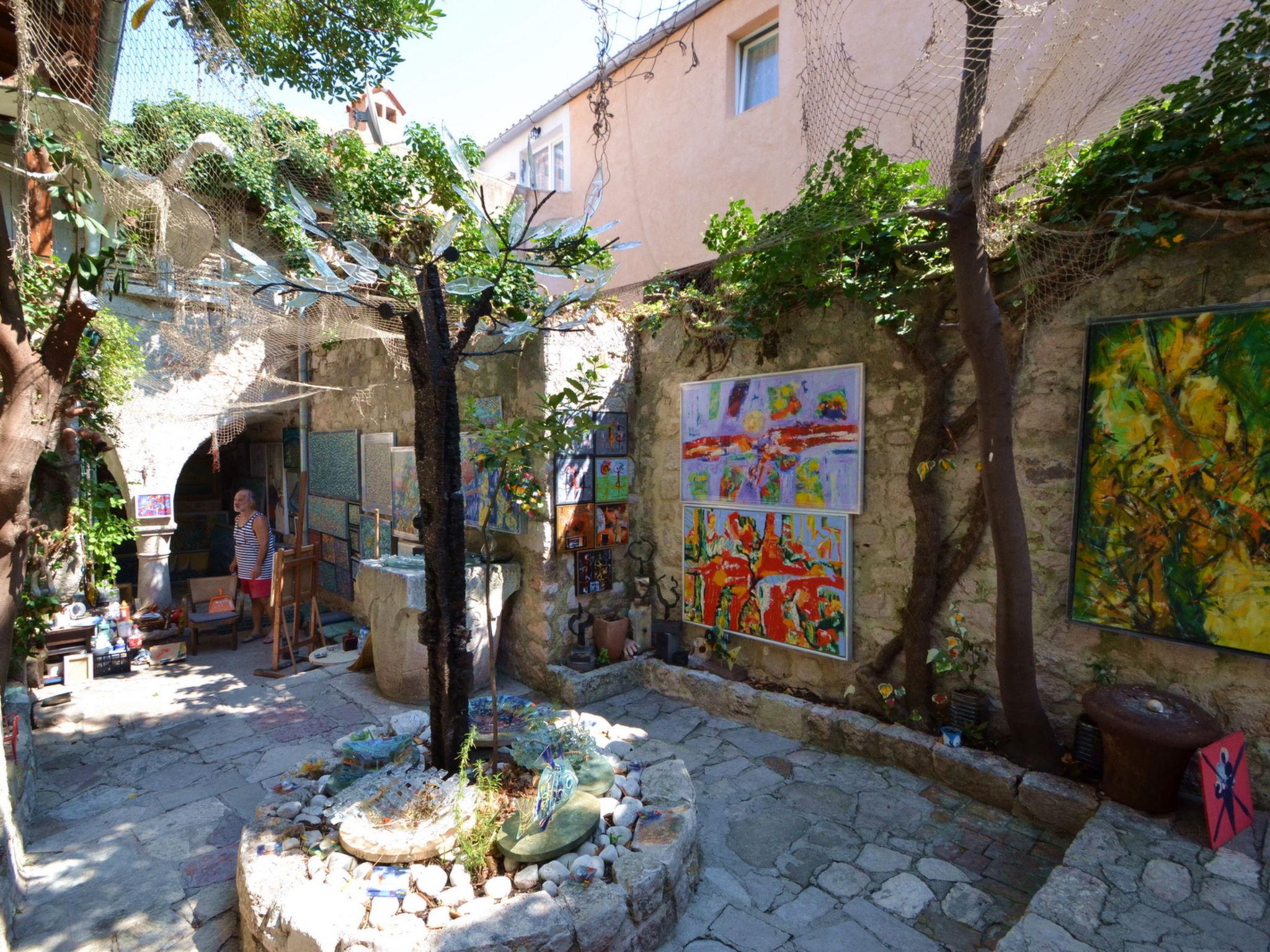 Photo 13 - Appartement de 2 chambres à Rab avec terrasse et vues à la mer