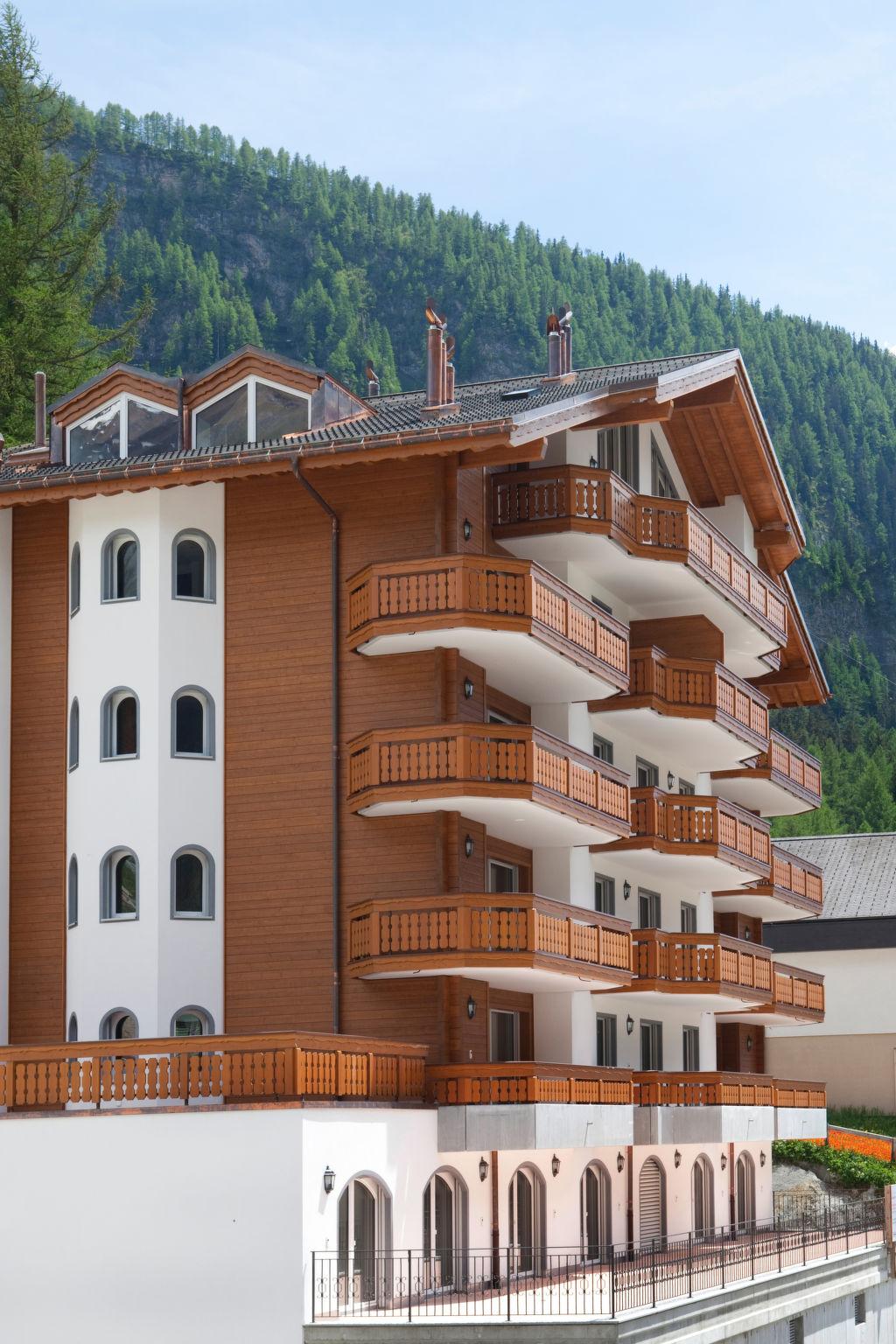 Foto 12 - Appartamento con 2 camere da letto a Leukerbad con sauna e vasca idromassaggio