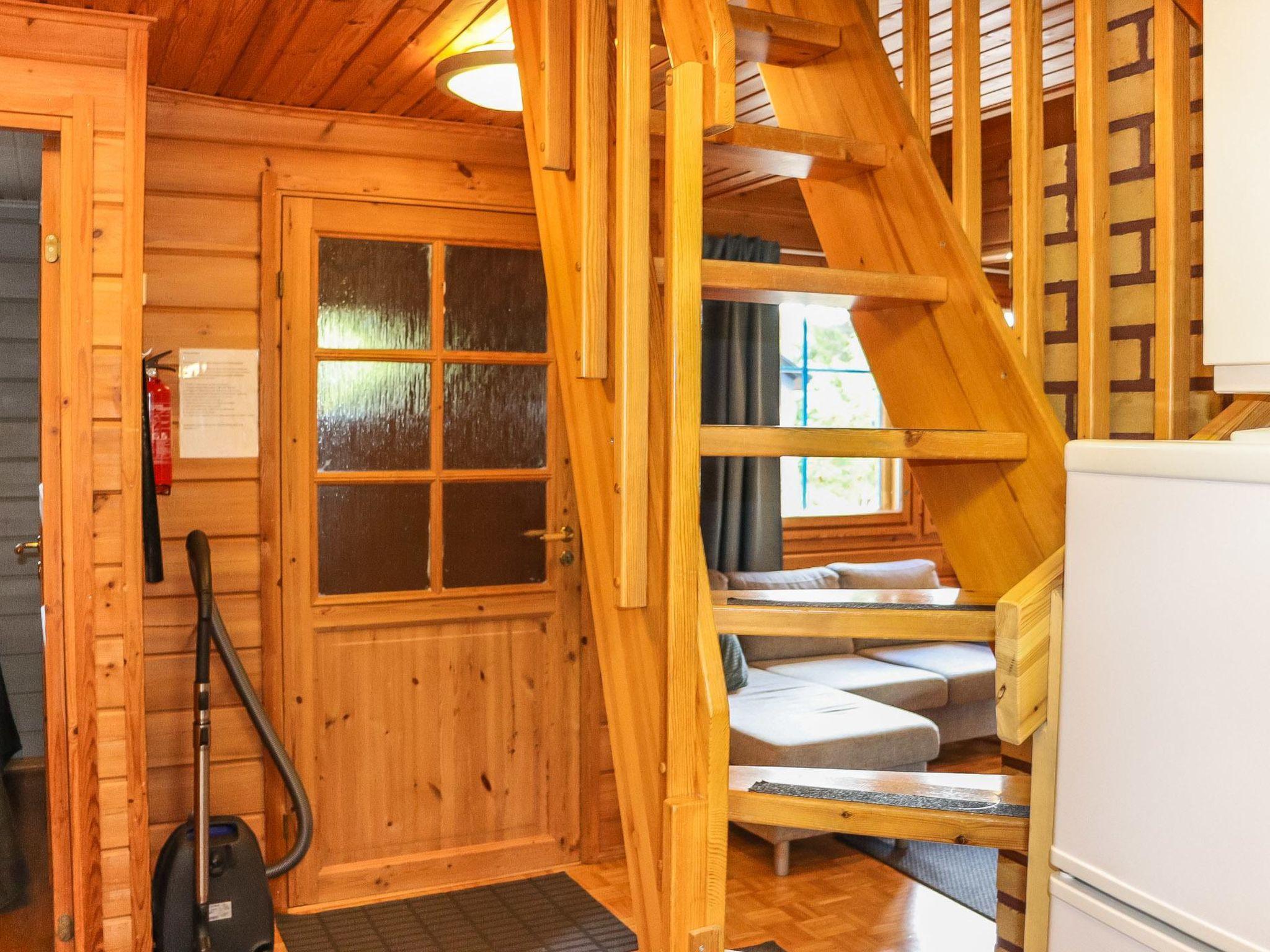 Foto 10 - Casa de 1 habitación en Puolanka con sauna y vistas a la montaña