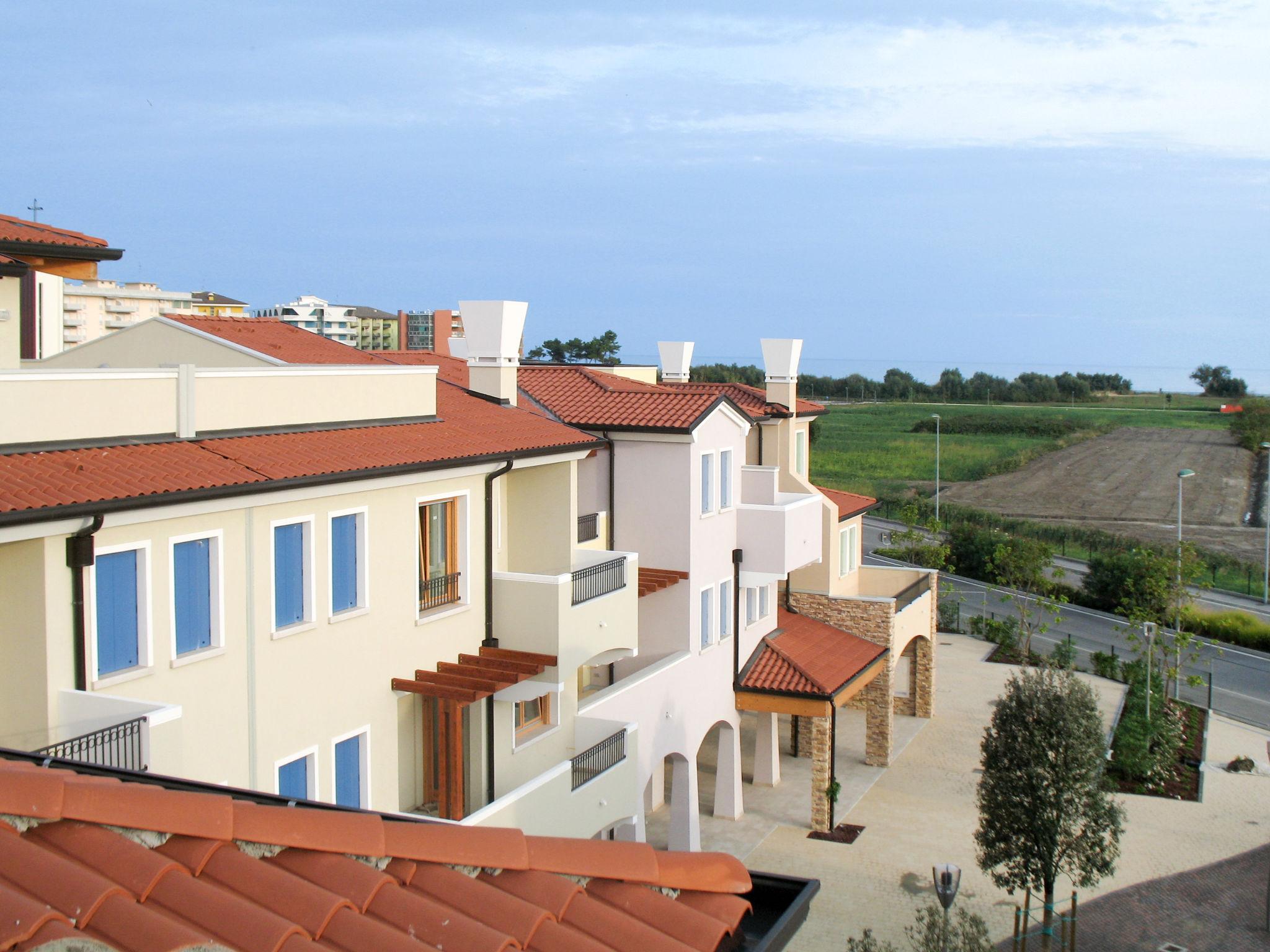 Photo 2 - Appartement de 2 chambres à Caorle avec piscine et vues à la mer