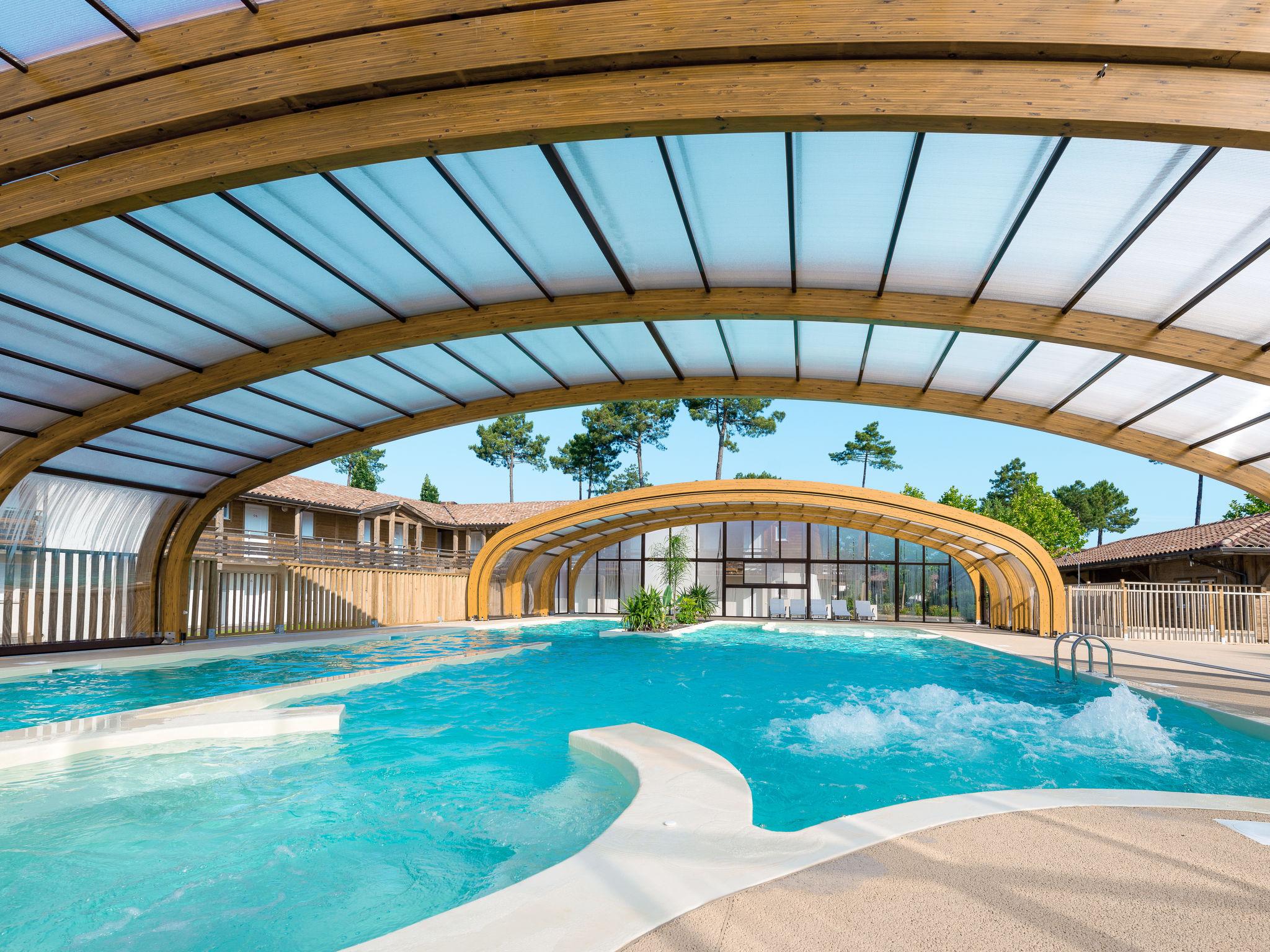 Photo 2 - Maison de 2 chambres à Parentis-en-Born avec piscine et jardin