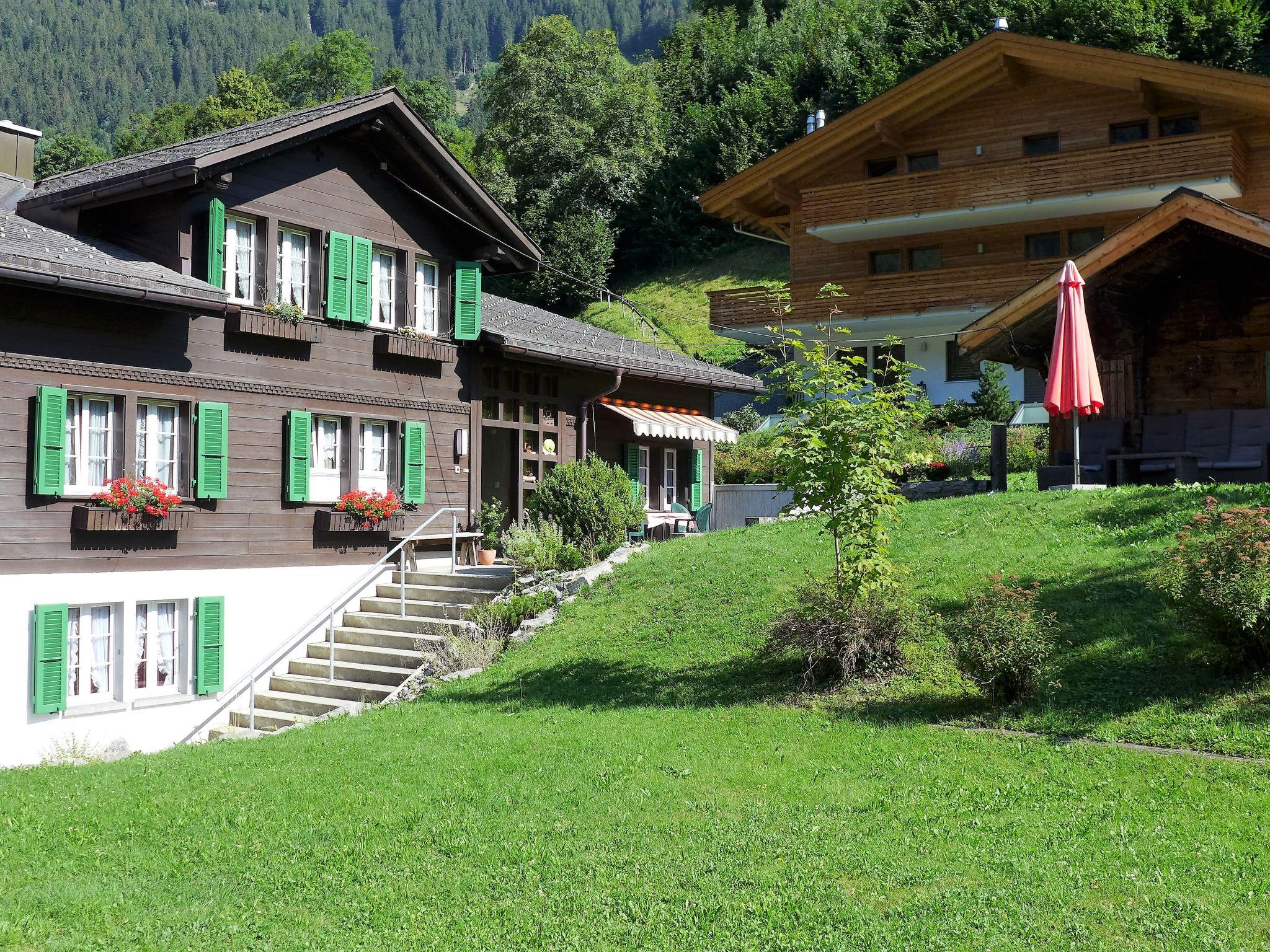 Foto 13 - Appartamento a Grindelwald con giardino