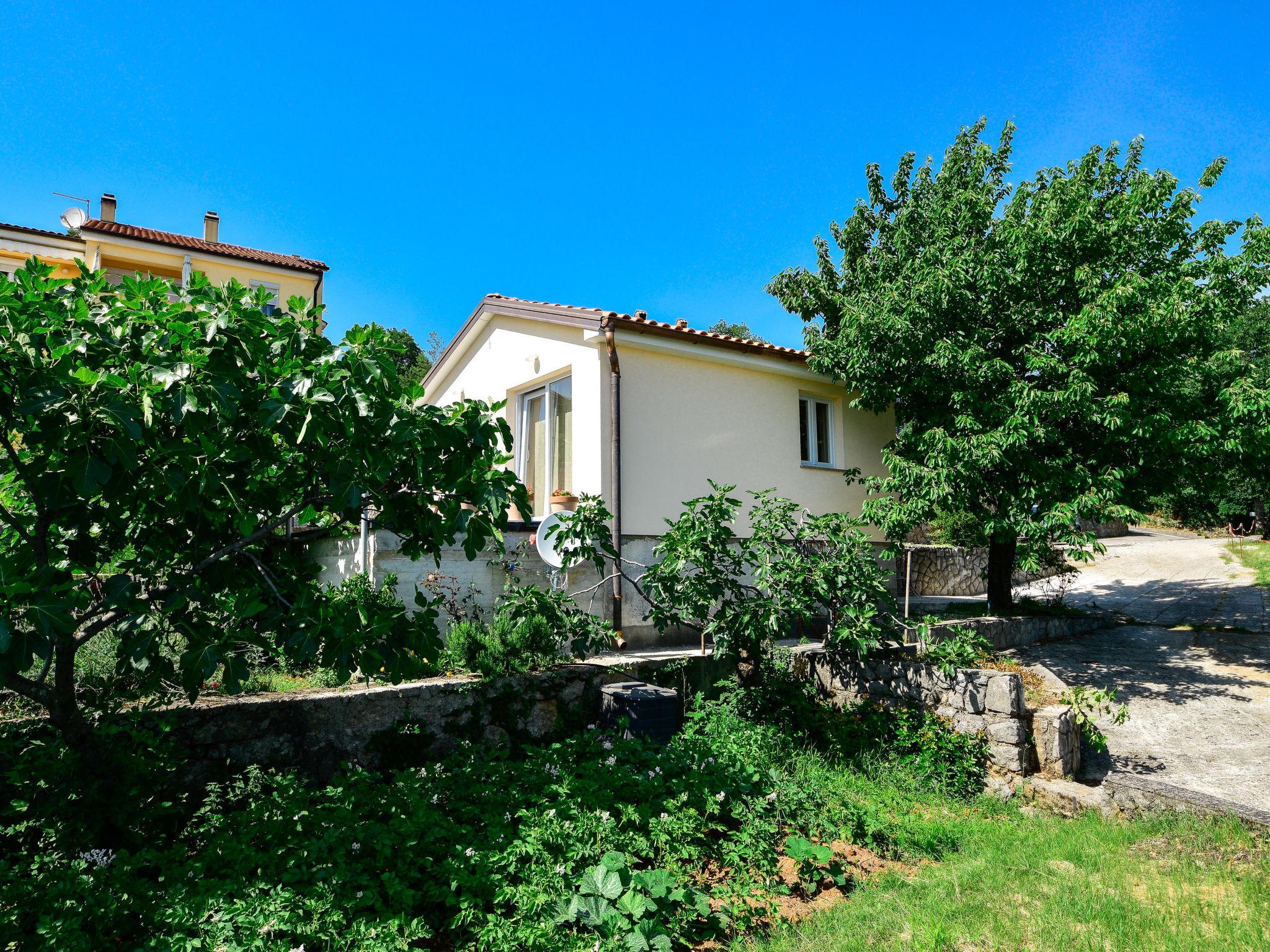 Photo 12 - Maison de 1 chambre à Opatija avec jardin et vues à la mer