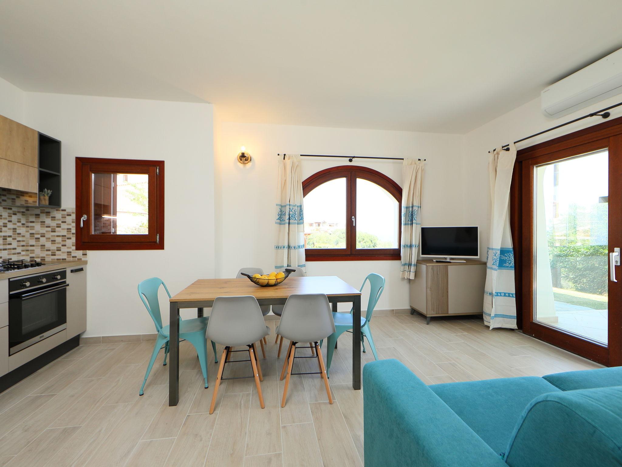 Photo 7 - Appartement de 2 chambres à Budoni avec piscine et vues à la mer