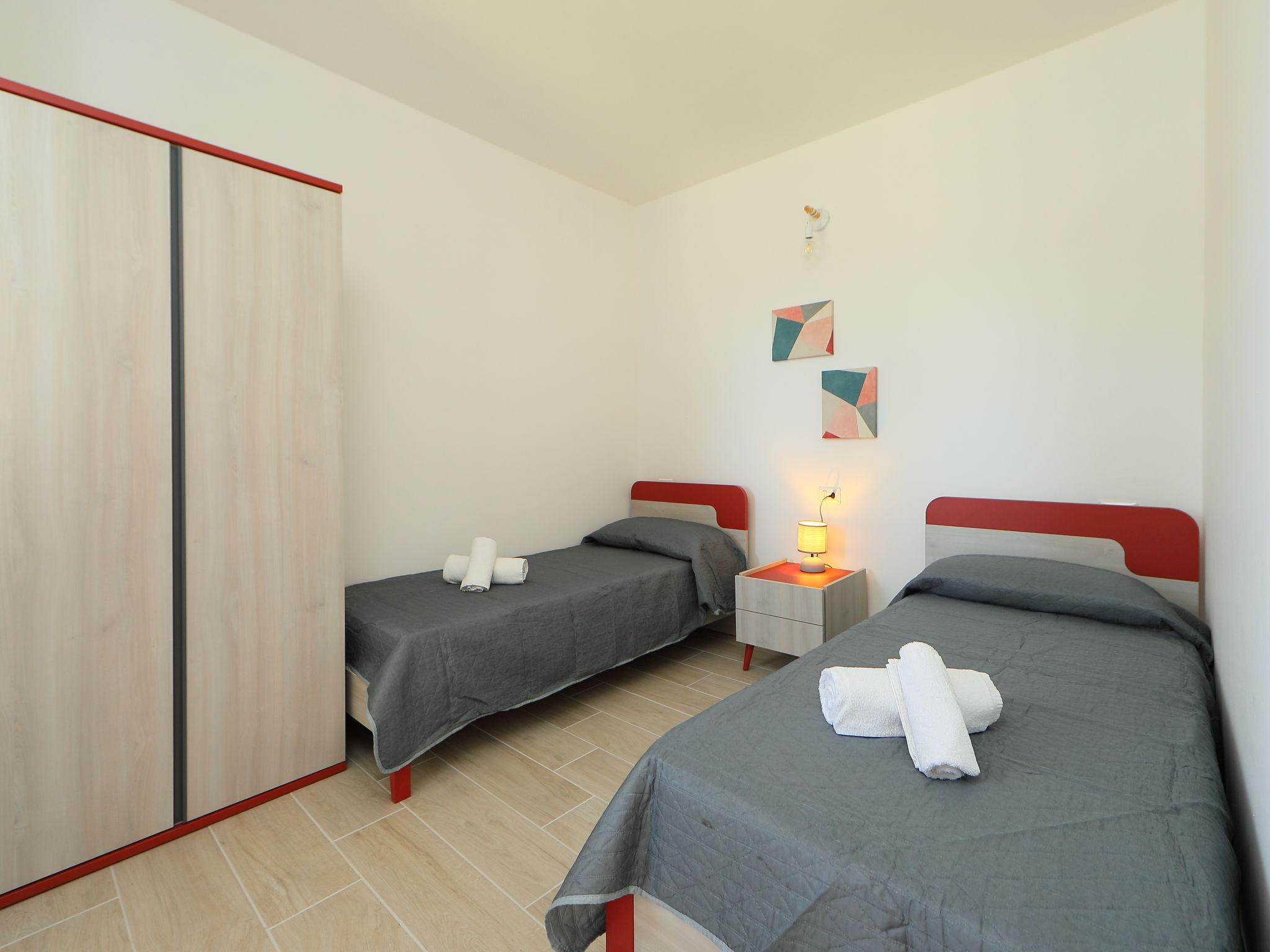 Foto 14 - Apartment mit 2 Schlafzimmern in Budoni mit schwimmbad und blick aufs meer