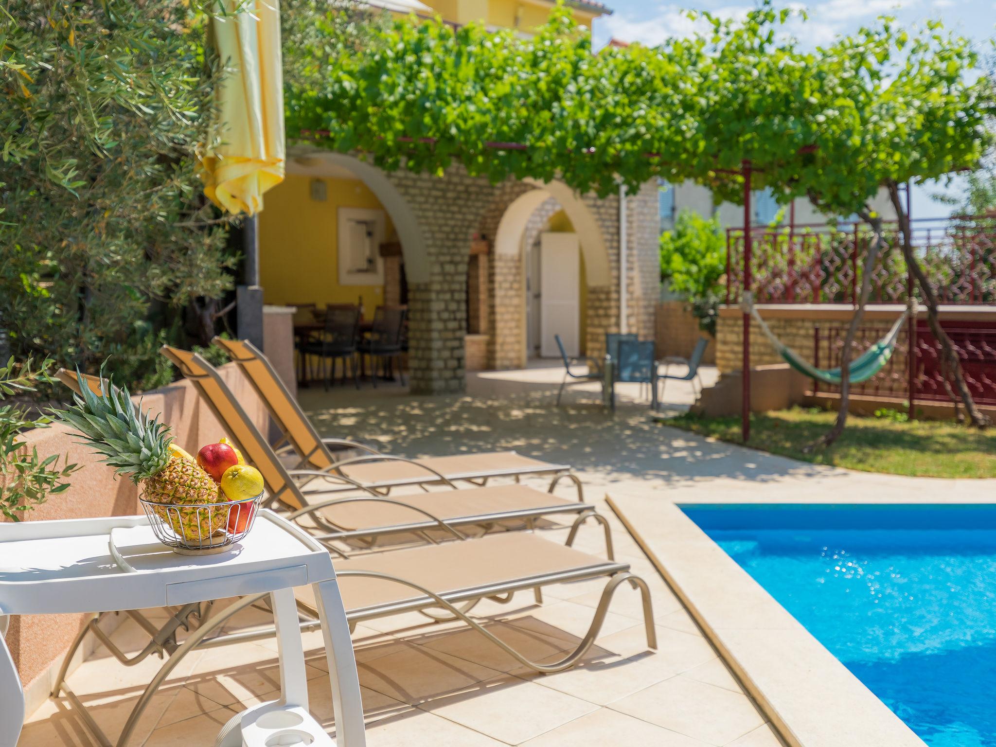 Photo 6 - Maison de 3 chambres à Ližnjan avec piscine privée et vues à la mer