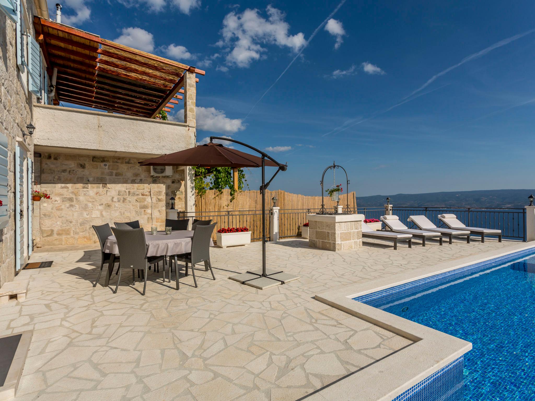 Photo 18 - Maison de 2 chambres à Dugi Rat avec piscine privée et vues à la mer