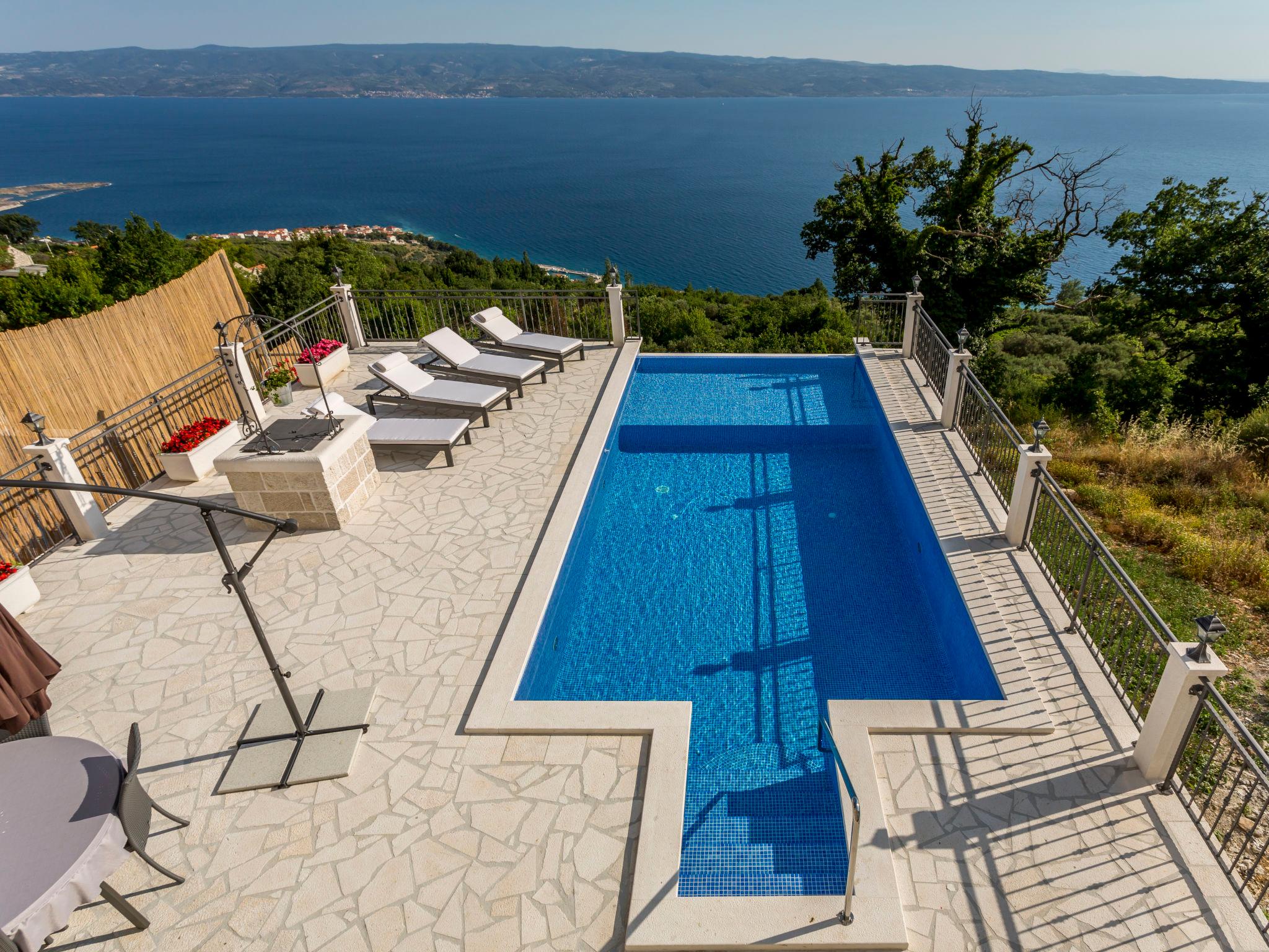 Foto 34 - Casa con 2 camere da letto a Dugi Rat con piscina privata e vista mare