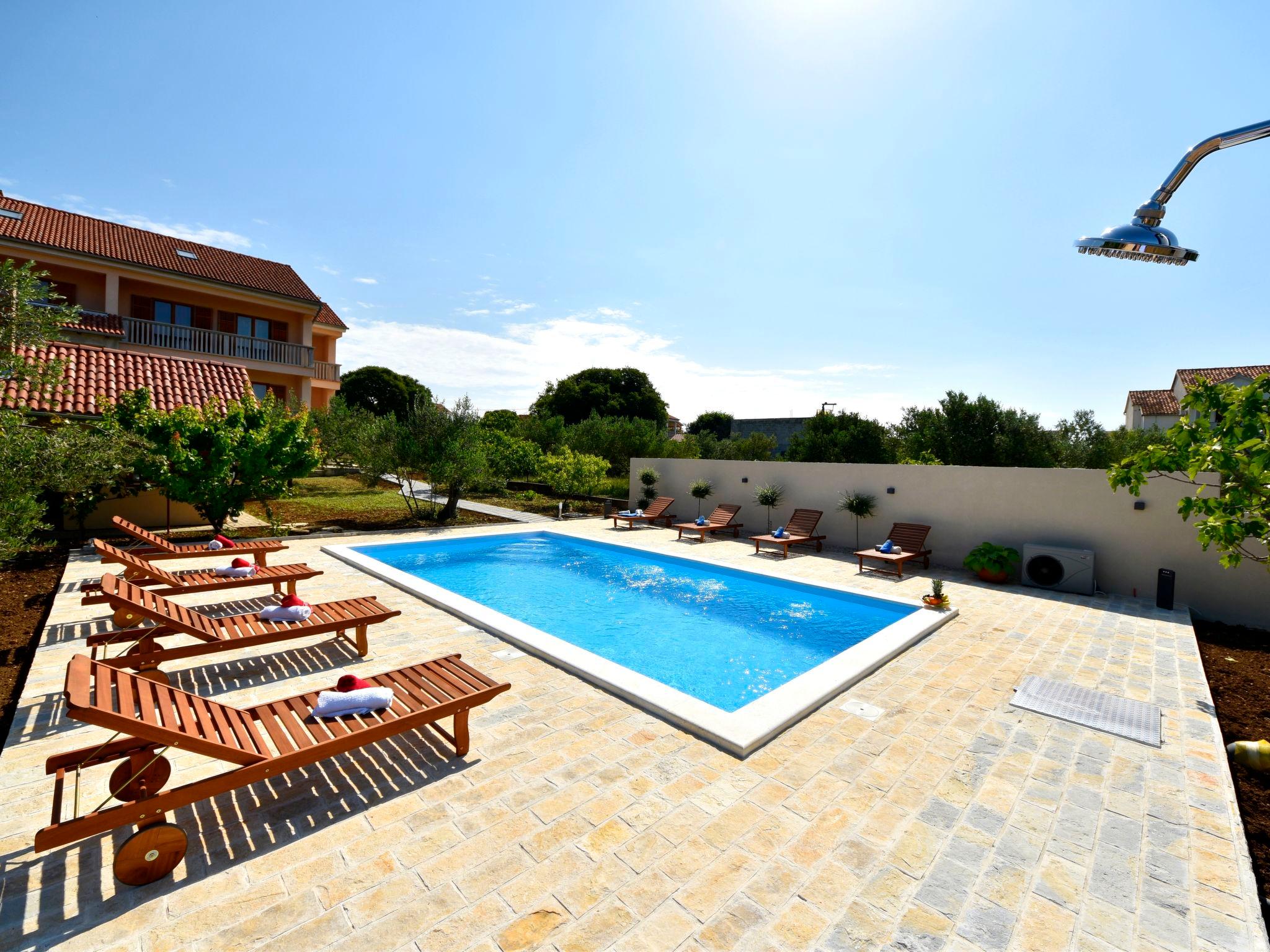 Photo 3 - Appartement de 2 chambres à Pakoštane avec piscine et vues à la mer