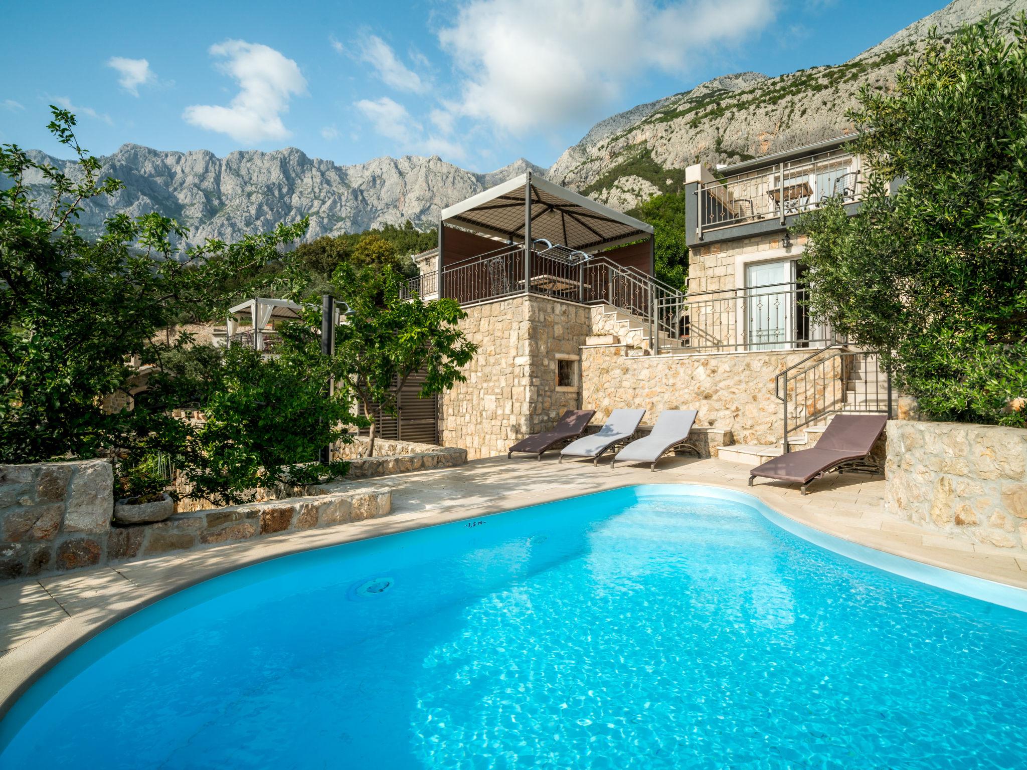 Foto 1 - Casa de 1 habitación en Makarska con piscina privada y vistas al mar