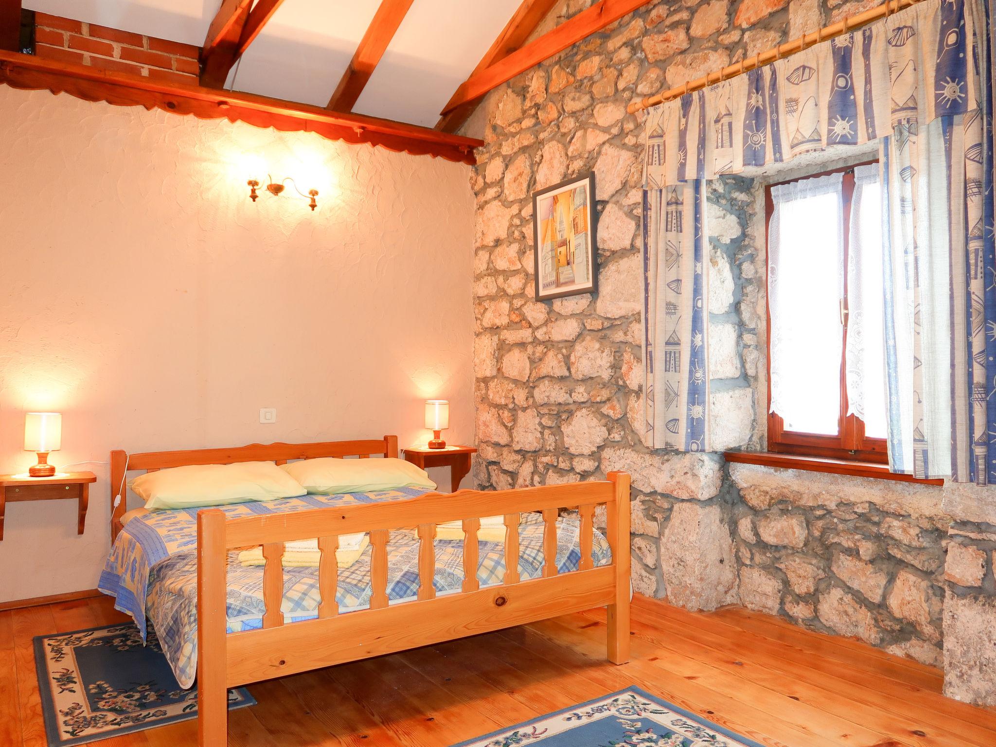 Photo 15 - Appartement de 1 chambre à Dobrinj avec piscine et vues à la mer