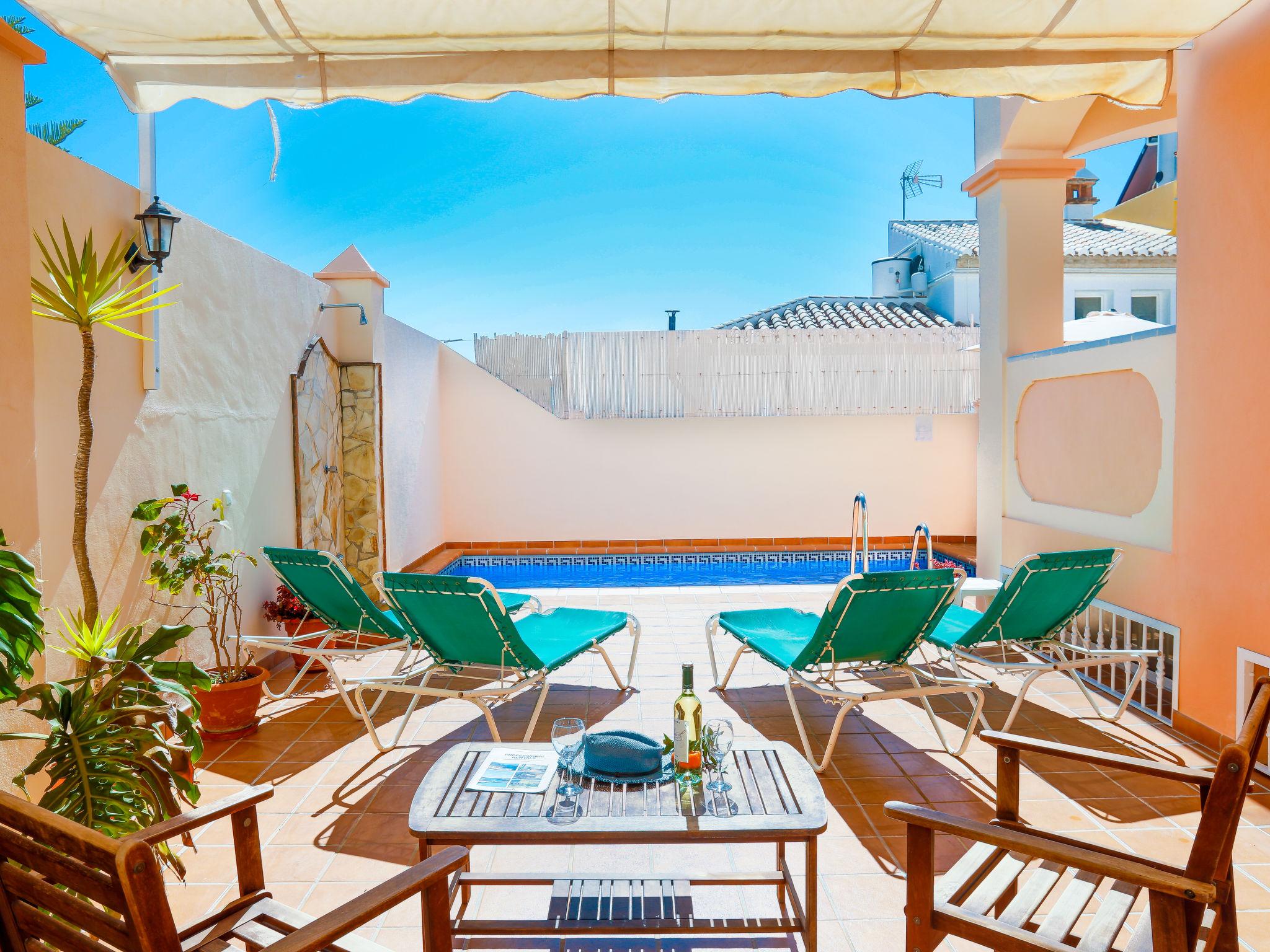 Photo 2 - Maison de 5 chambres à Nerja avec piscine privée et vues à la mer