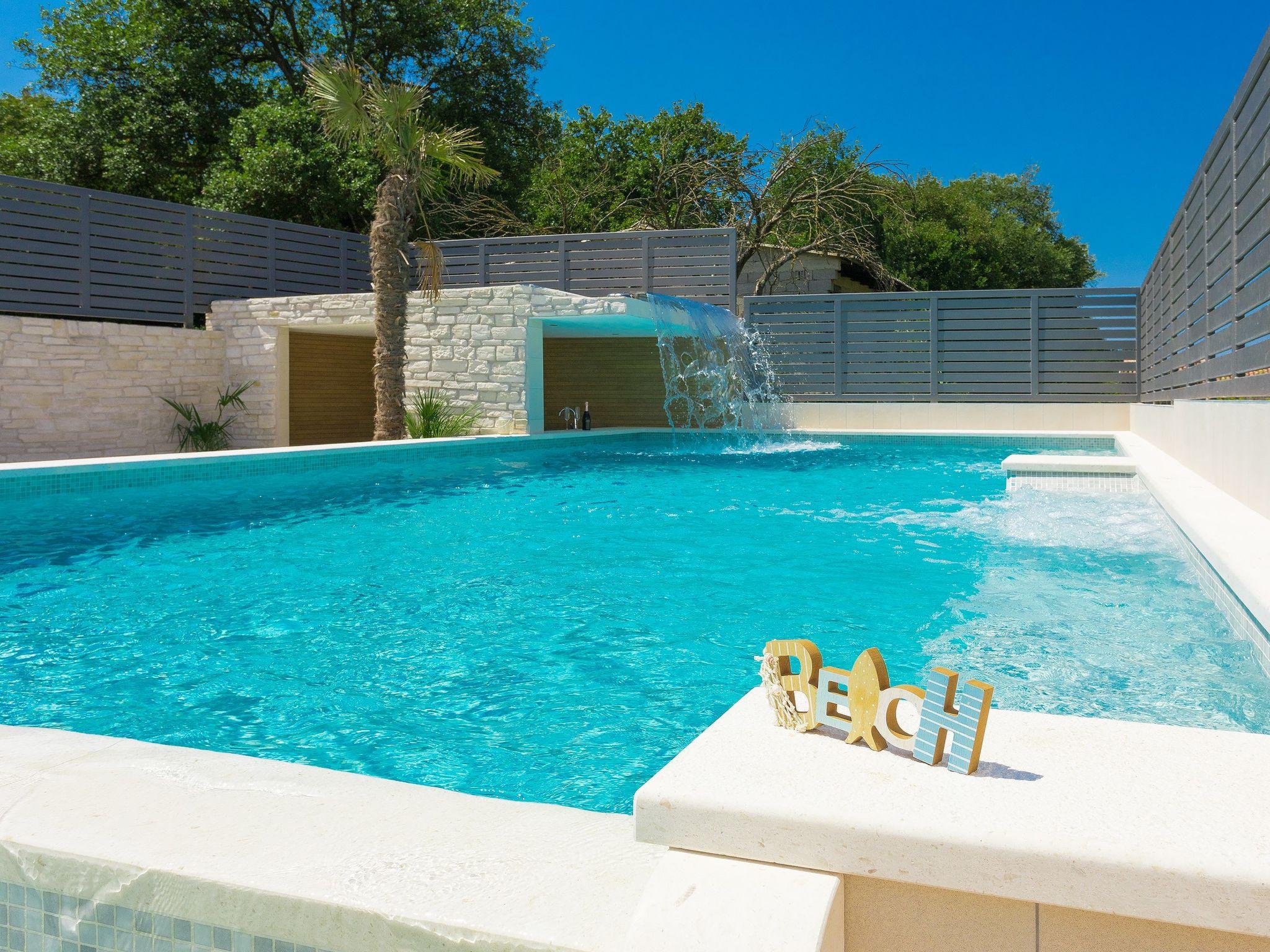 Foto 11 - Casa de 3 habitaciones en Pula con piscina privada y vistas al mar