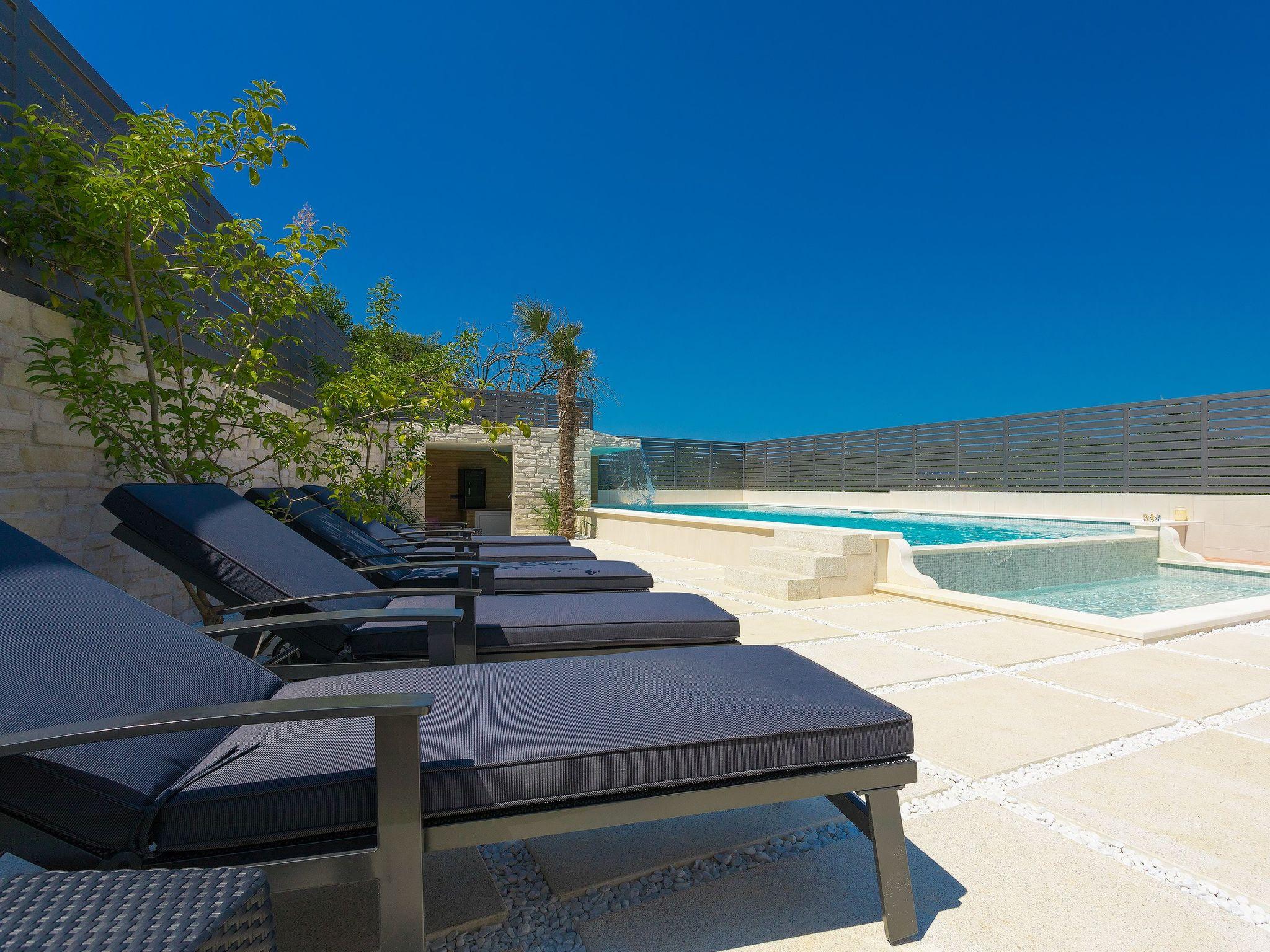 Photo 10 - Maison de 3 chambres à Pula avec piscine privée et vues à la mer