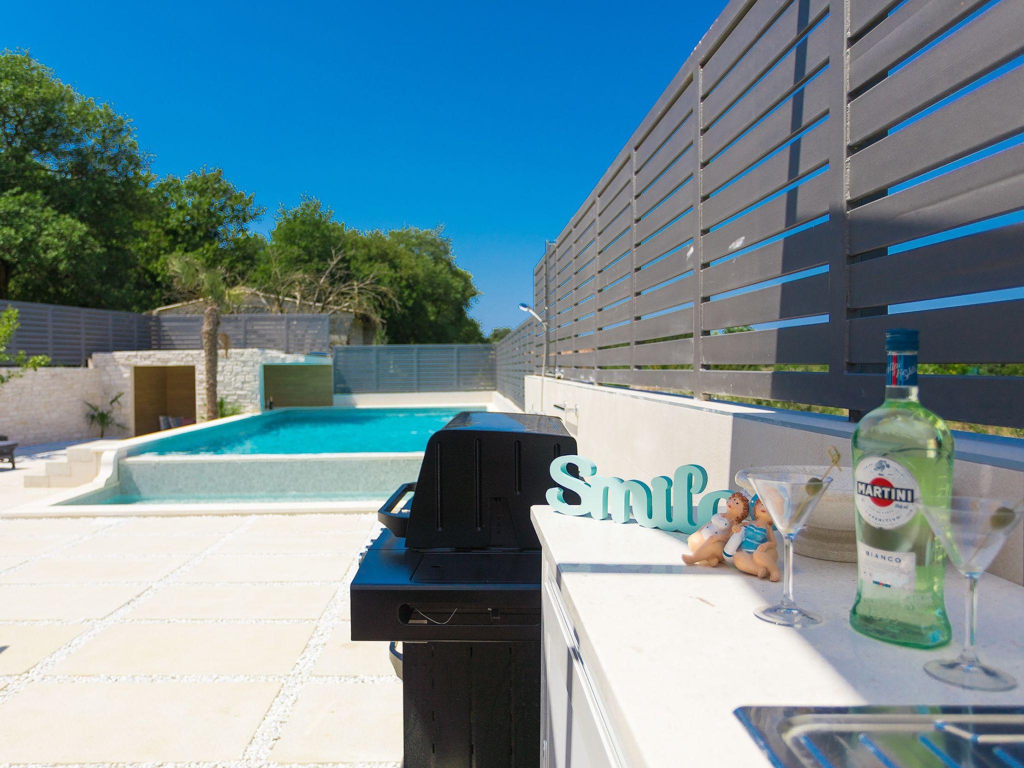 Photo 41 - Maison de 3 chambres à Pula avec piscine privée et jardin