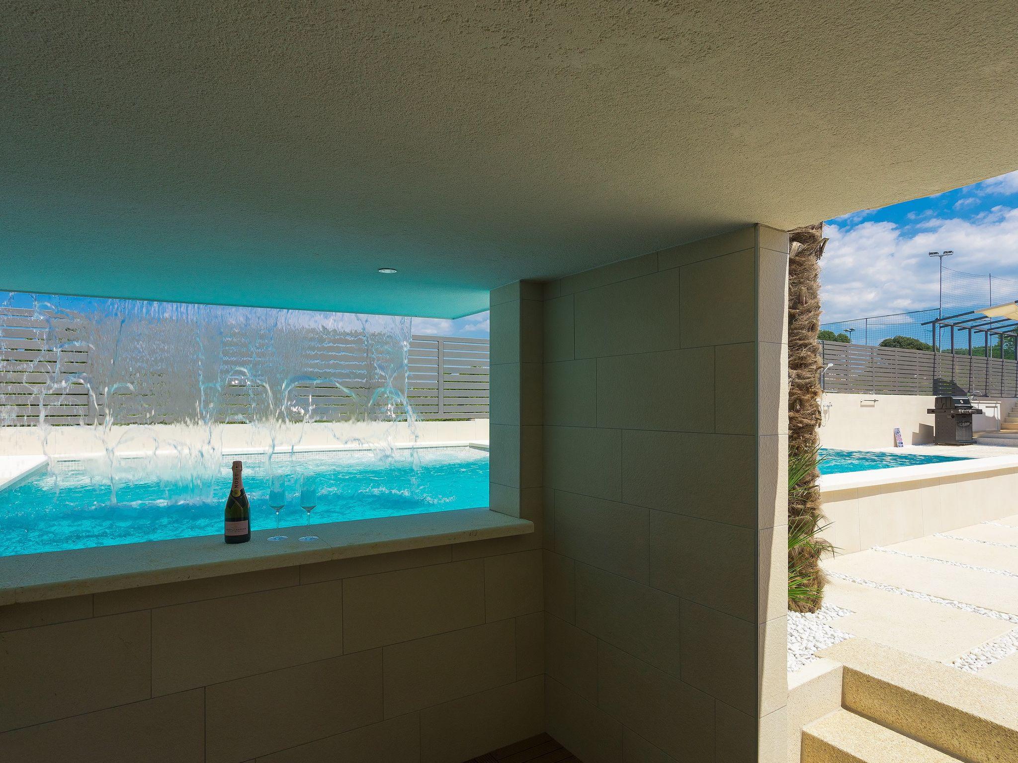 Foto 45 - Casa de 3 habitaciones en Pula con piscina privada y vistas al mar