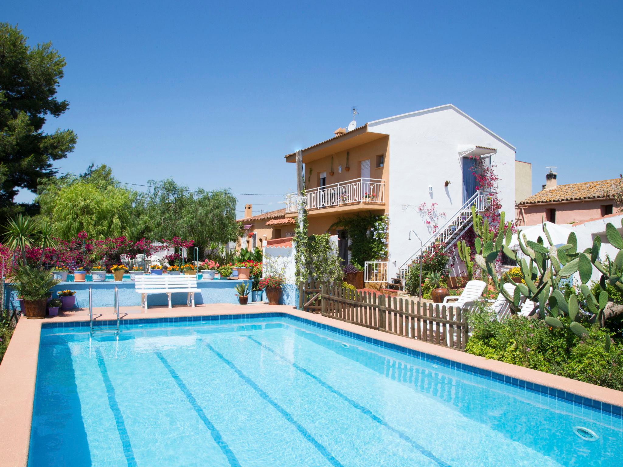Foto 1 - Casa de 5 habitaciones en Camarles con piscina privada y jardín
