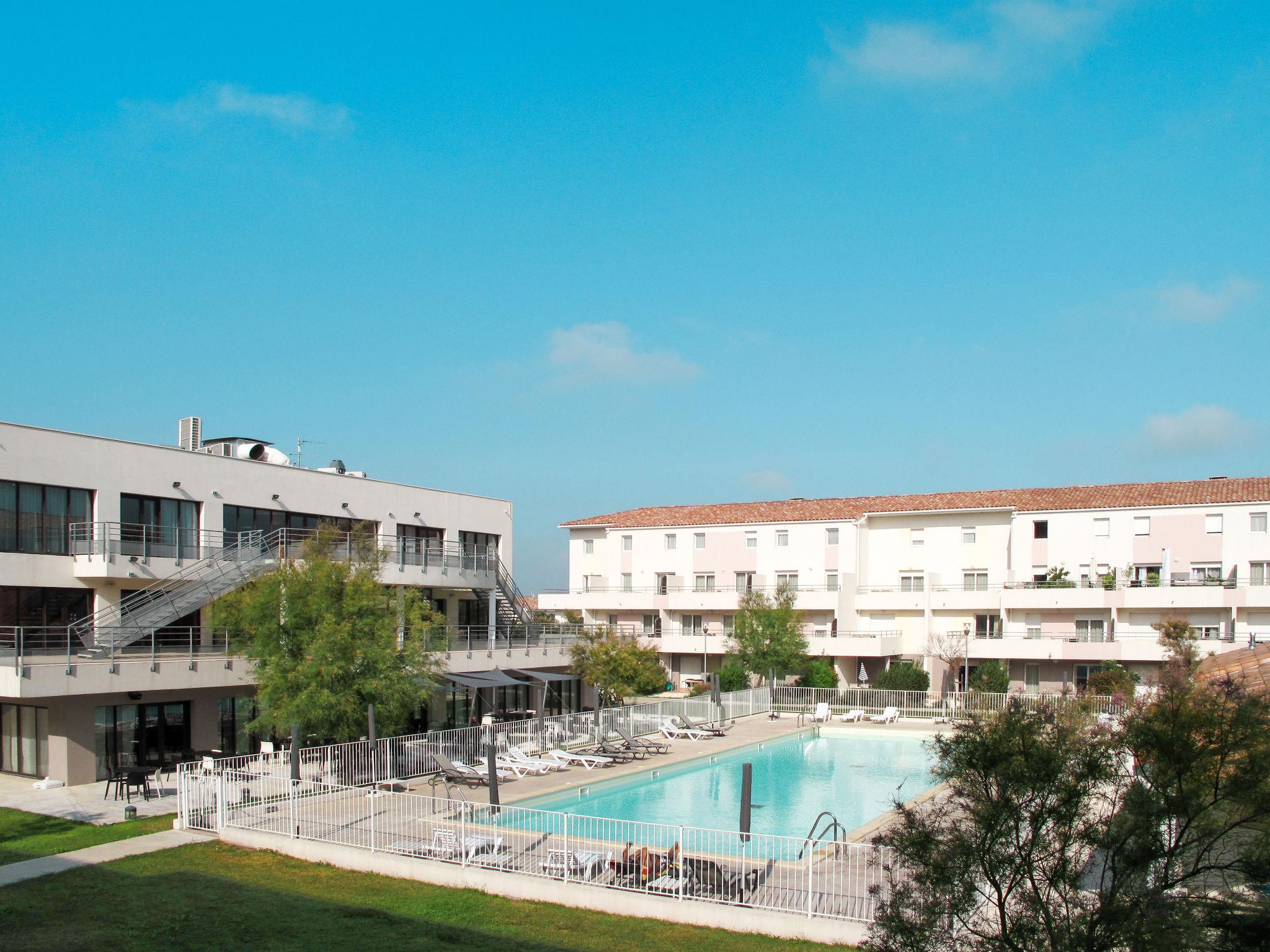 Foto 16 - Appartamento con 2 camere da letto a Le Grau-du-Roi con piscina e terrazza