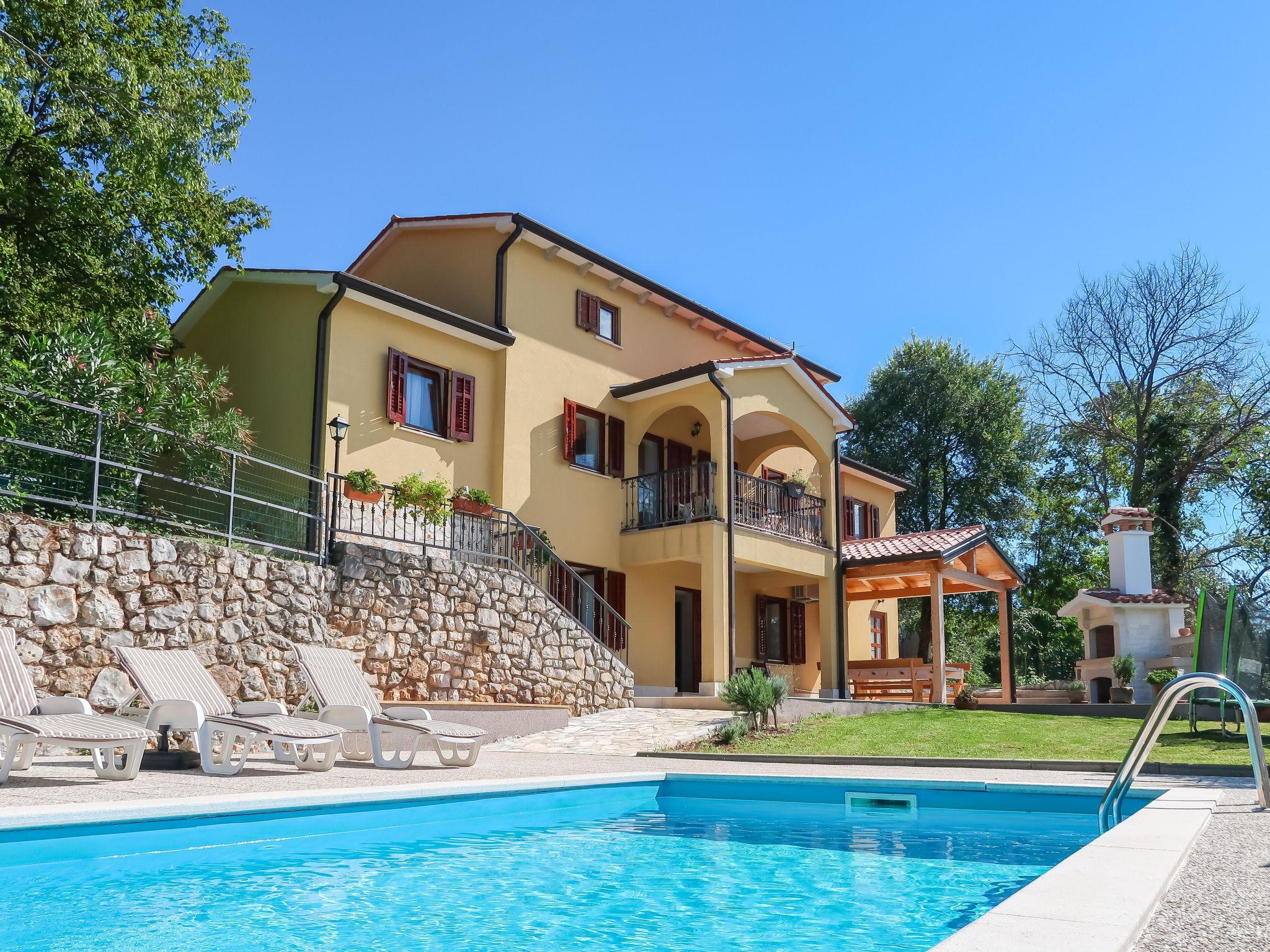 Photo 1 - Maison de 4 chambres à Labin avec piscine privée et vues à la mer