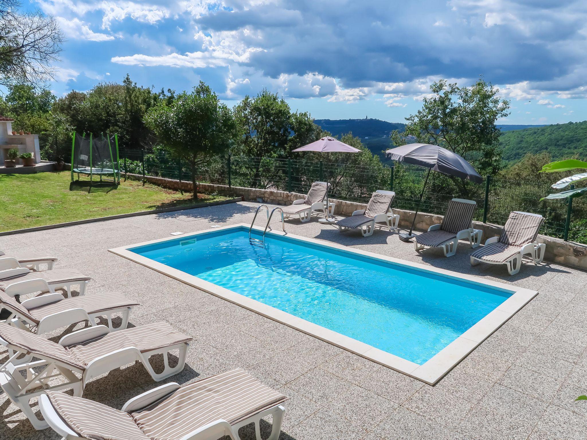 Photo 2 - Maison de 4 chambres à Labin avec piscine privée et jardin