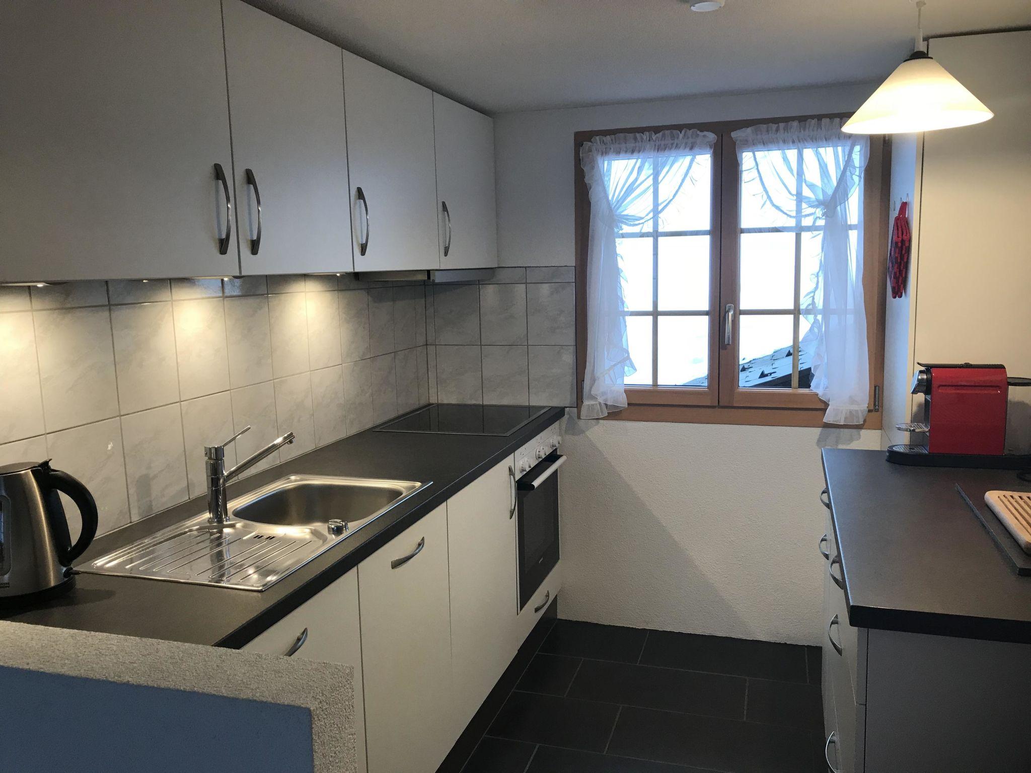 Foto 26 - Apartamento de 2 quartos em Adelboden com jardim