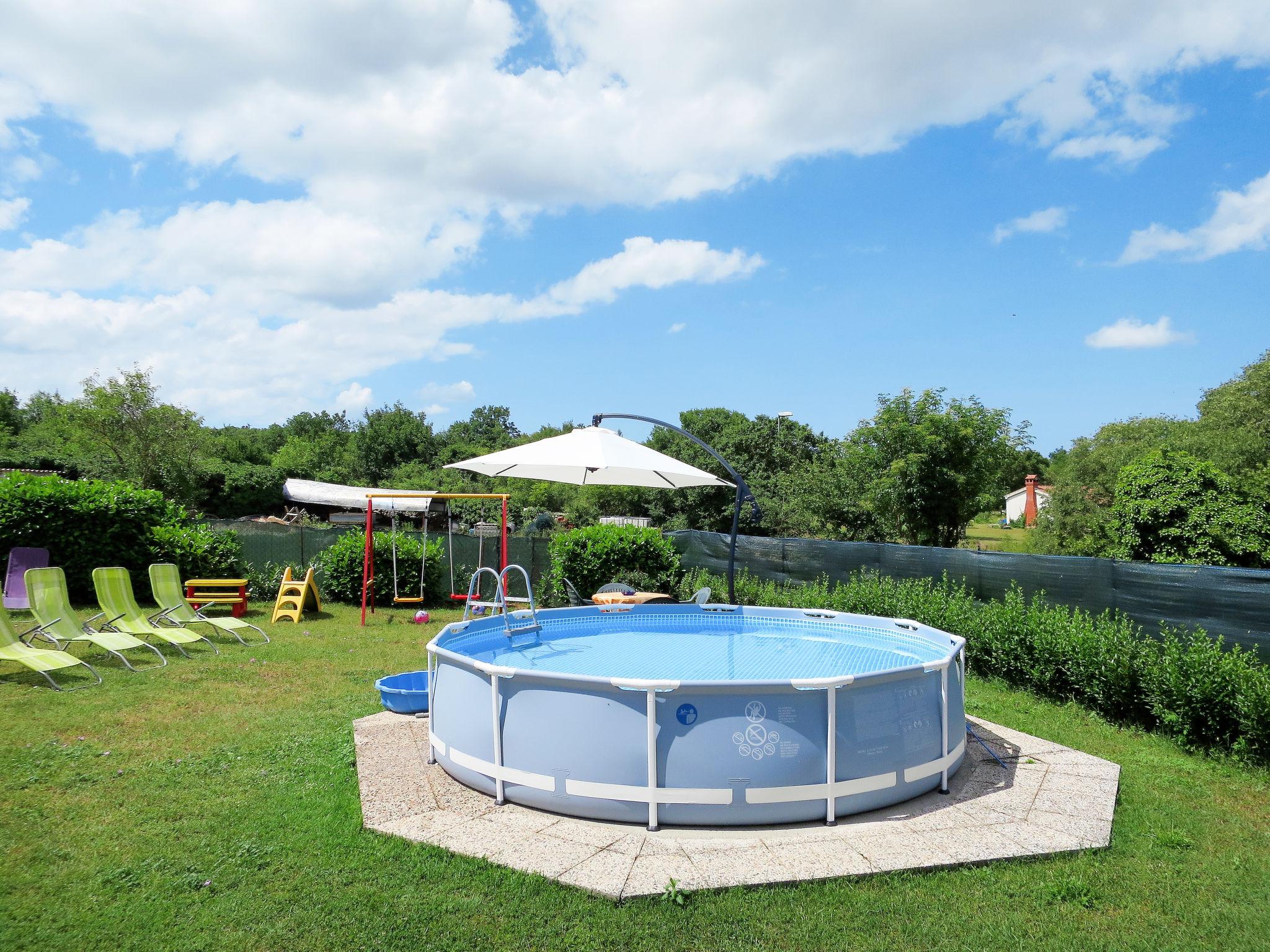 Photo 2 - Maison de 1 chambre à Kanfanar avec piscine et vues à la mer