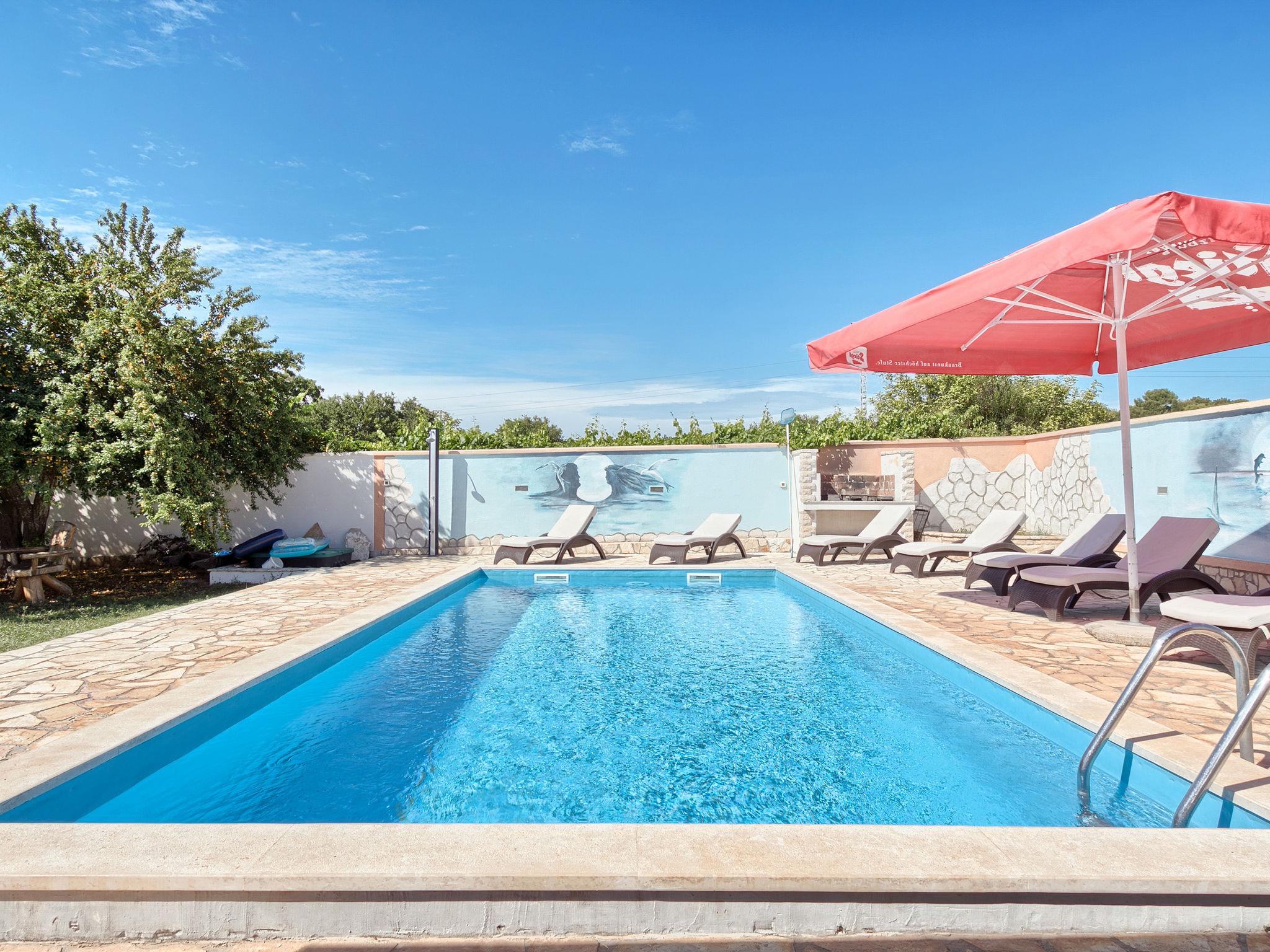 Foto 5 - Casa de 6 quartos em Pula com piscina privada e vistas do mar