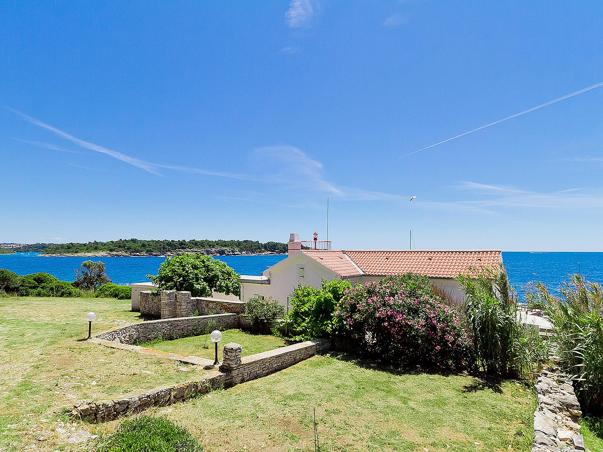 Photo 27 - Maison de 3 chambres à Pula avec jardin et vues à la mer