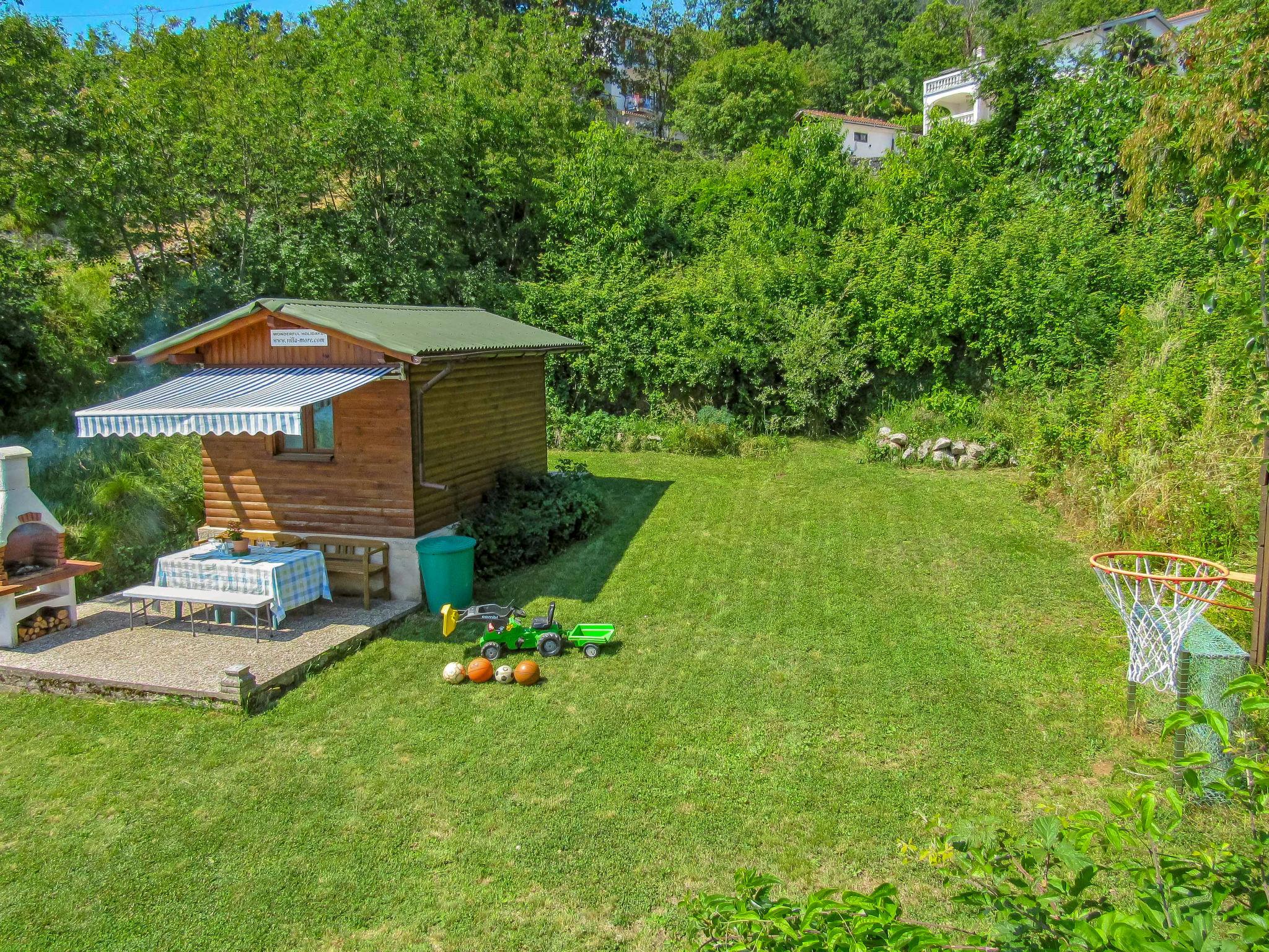 Foto 42 - Casa con 5 camere da letto a Lovran con piscina privata e giardino