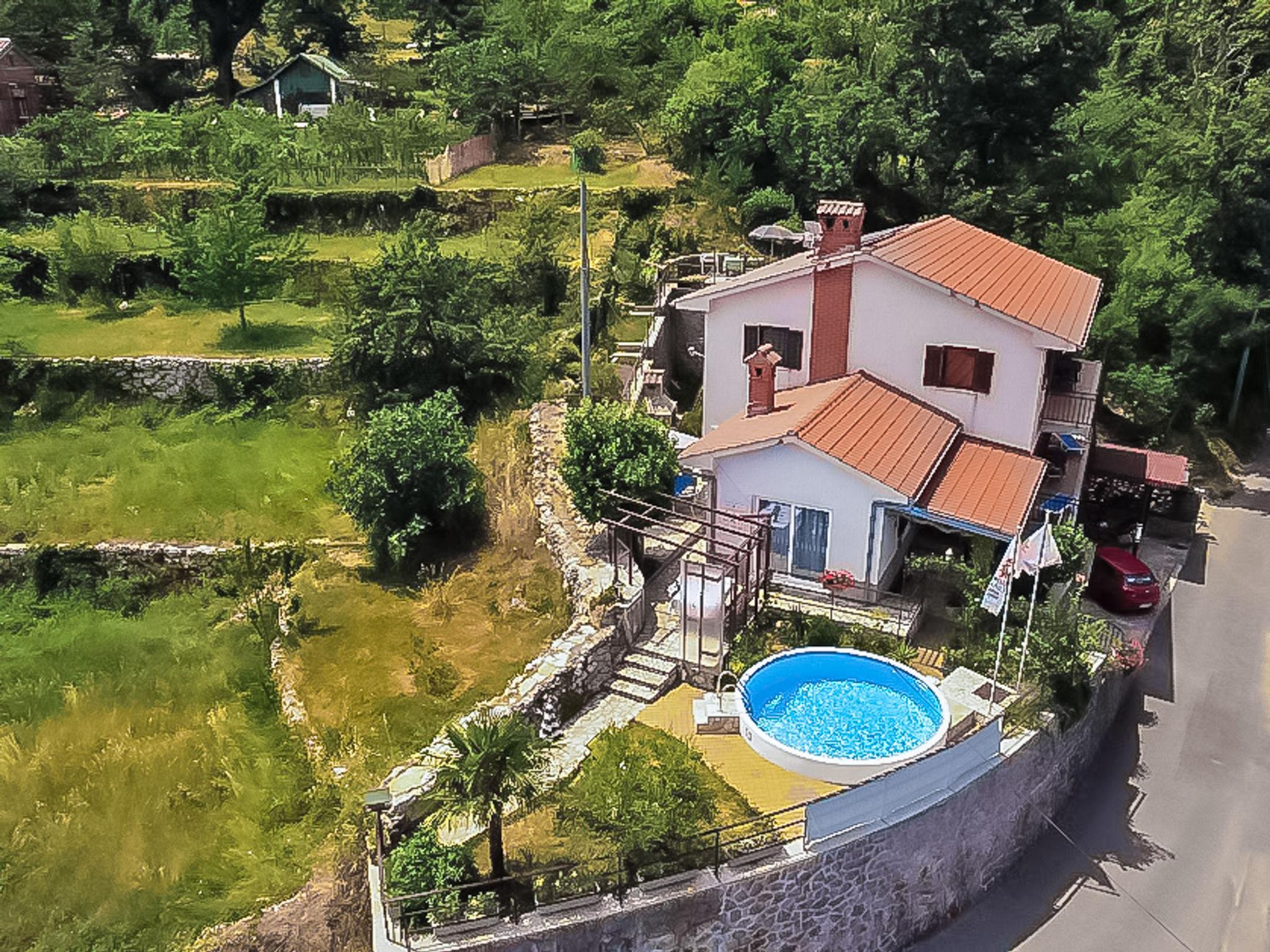 Foto 47 - Casa con 5 camere da letto a Lovran con piscina privata e giardino