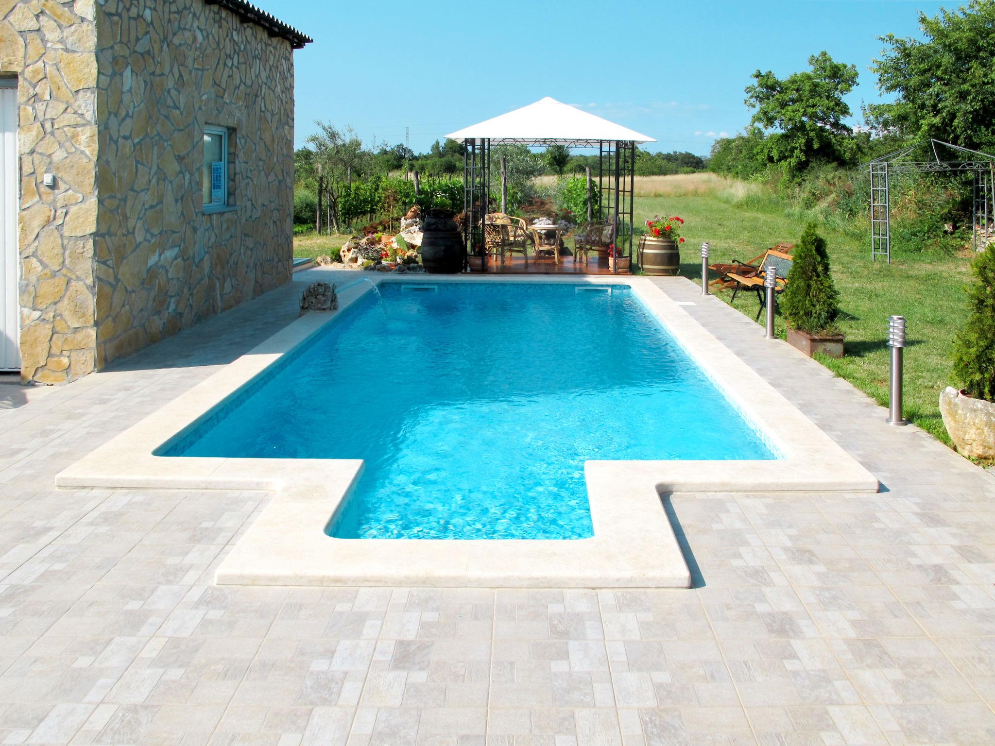 Foto 1 - Casa de 1 quarto em Marčana com piscina e vistas do mar