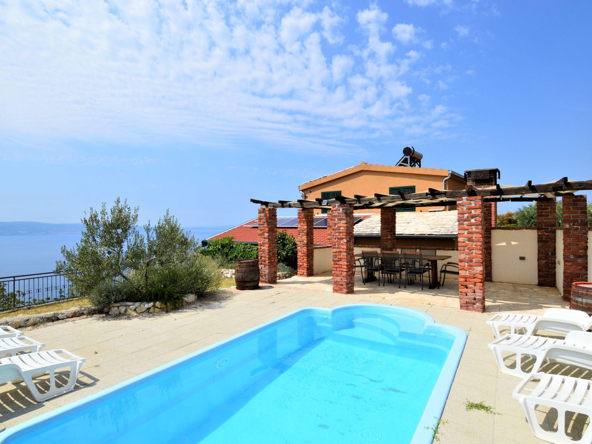 Photo 2 - Maison de 3 chambres à Dugi Rat avec piscine privée et jardin