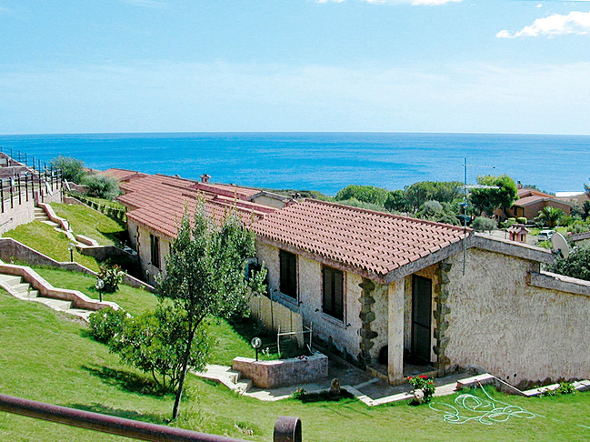 Foto 1 - Casa de 2 quartos em Villaputzu com piscina e vistas do mar