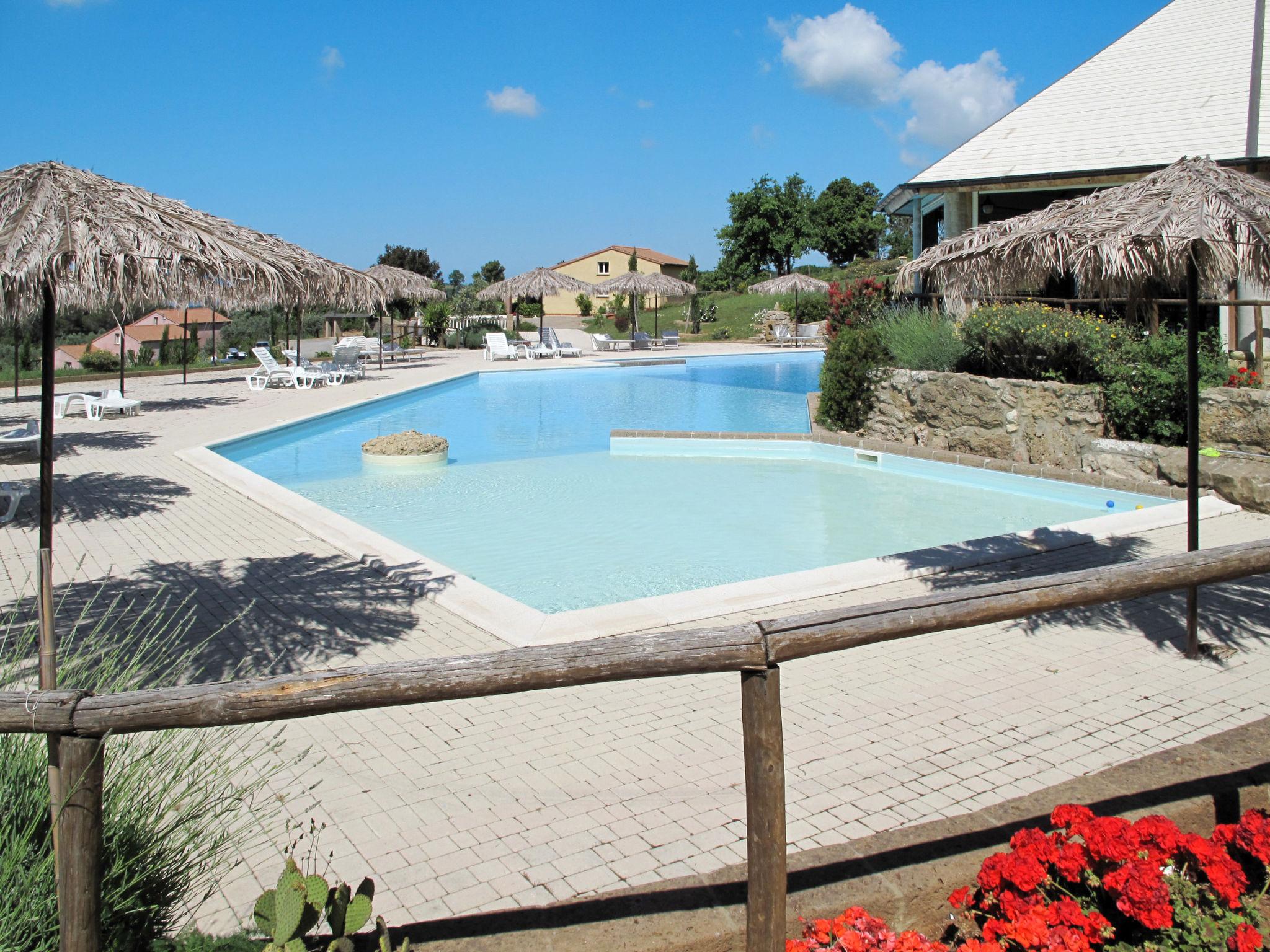 Foto 1 - Apartamento de 2 habitaciones en Riparbella con piscina y jardín
